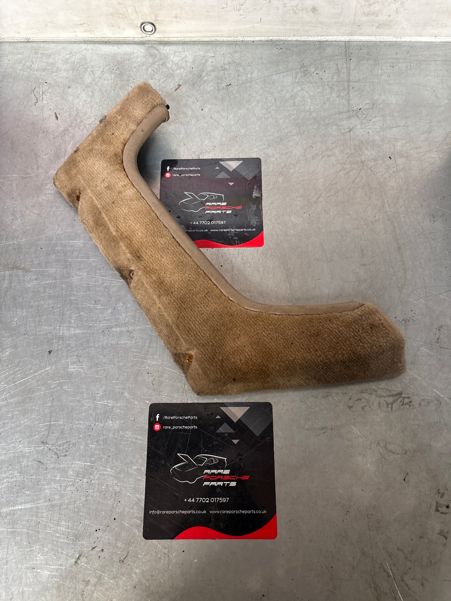 Porsche 924/944 Left, Passenger side cream carpeted door pocket, used 477867133