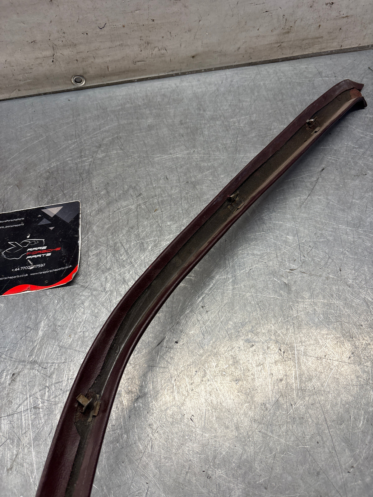 Porsche 928 right, off side door upper frame surround trim, burgundy 92855502602, used