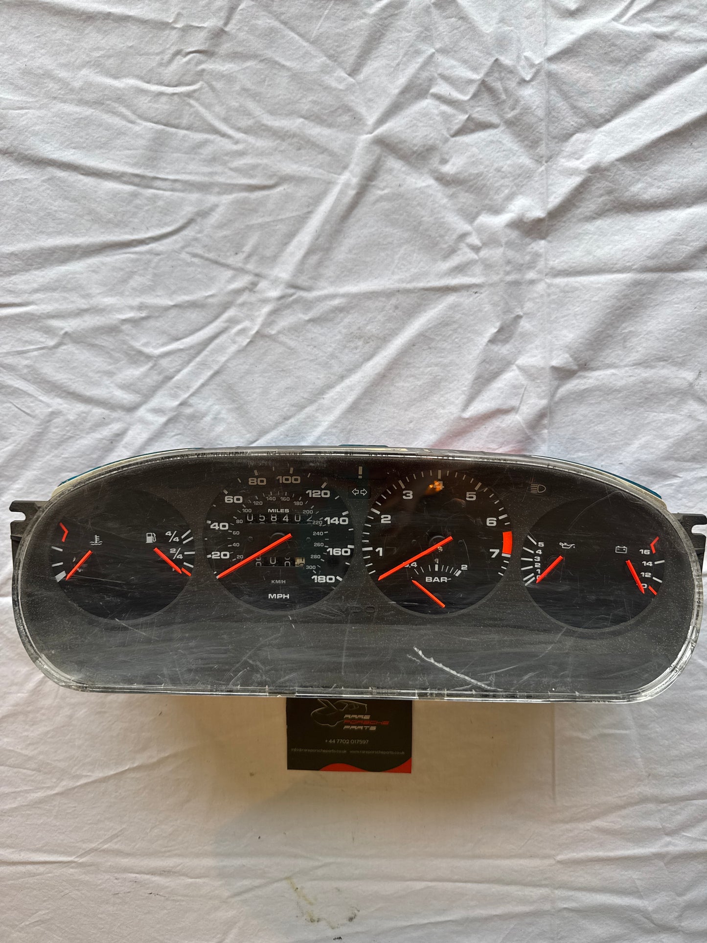 Porsche 944 Turbo dash clock binnacle pod speedometer, 951641311 used 058402 miles plastic screen has some small scratches