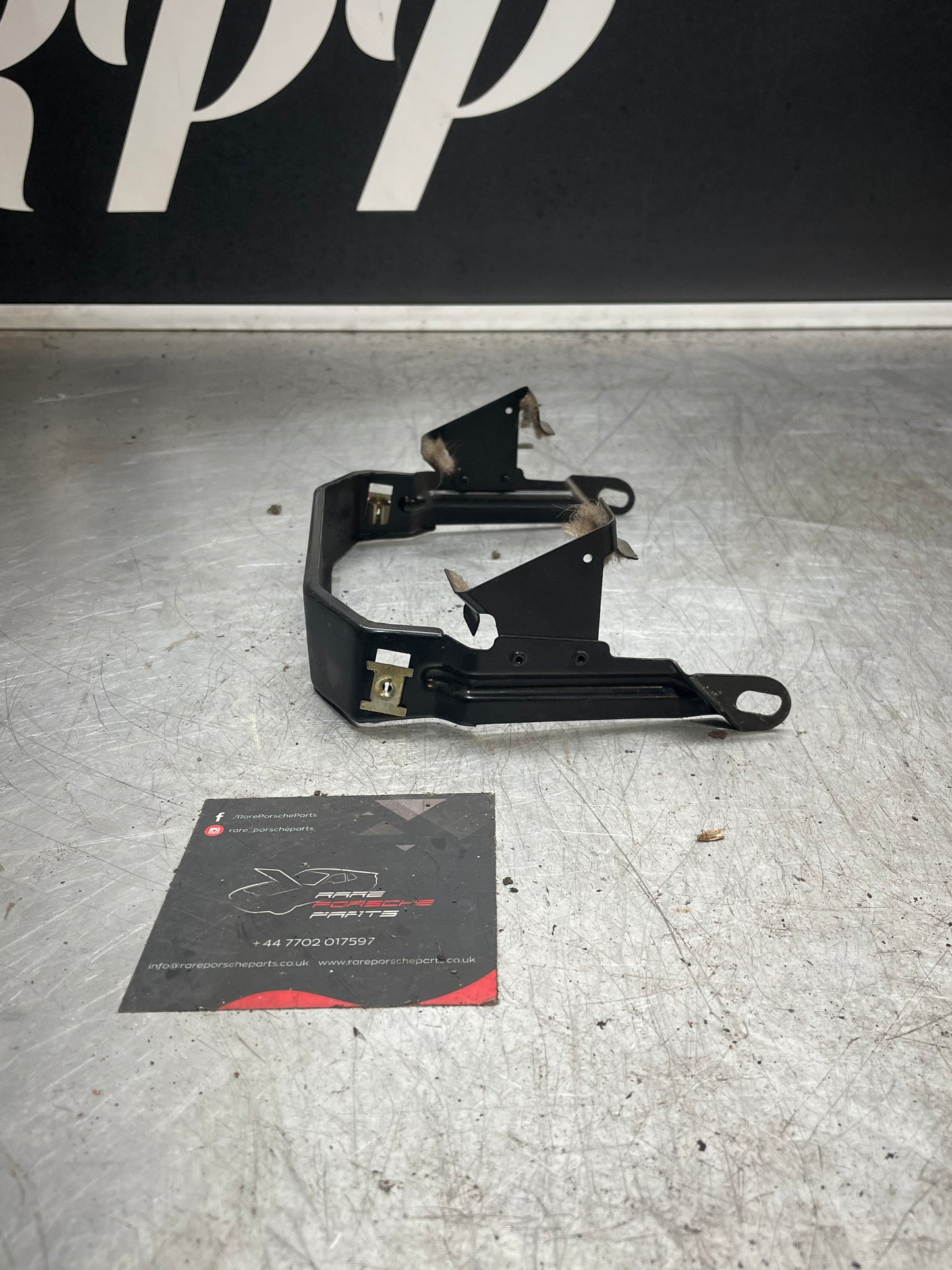 Porsche 944 center console bracket, refurbished 94455206702