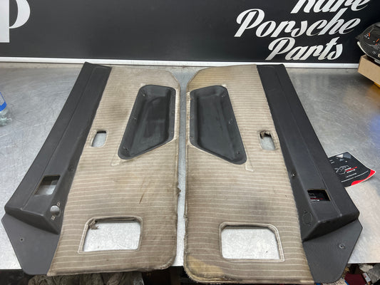 Porsche 924 944 -85.5 pair of Used RHD Porsche pinstripe black / white door cards, 478867011 / 478867012 used