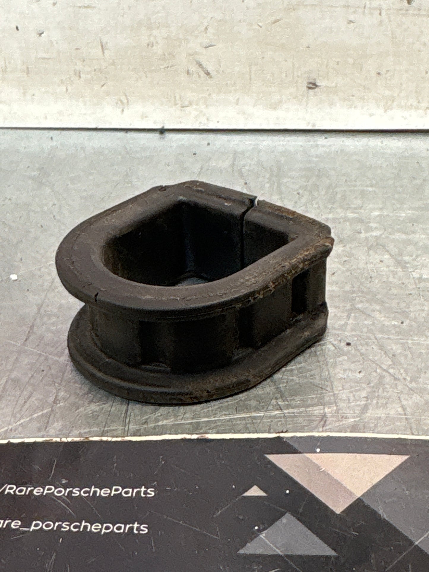 Porsche 944 steering rack clamp, used 94434713700