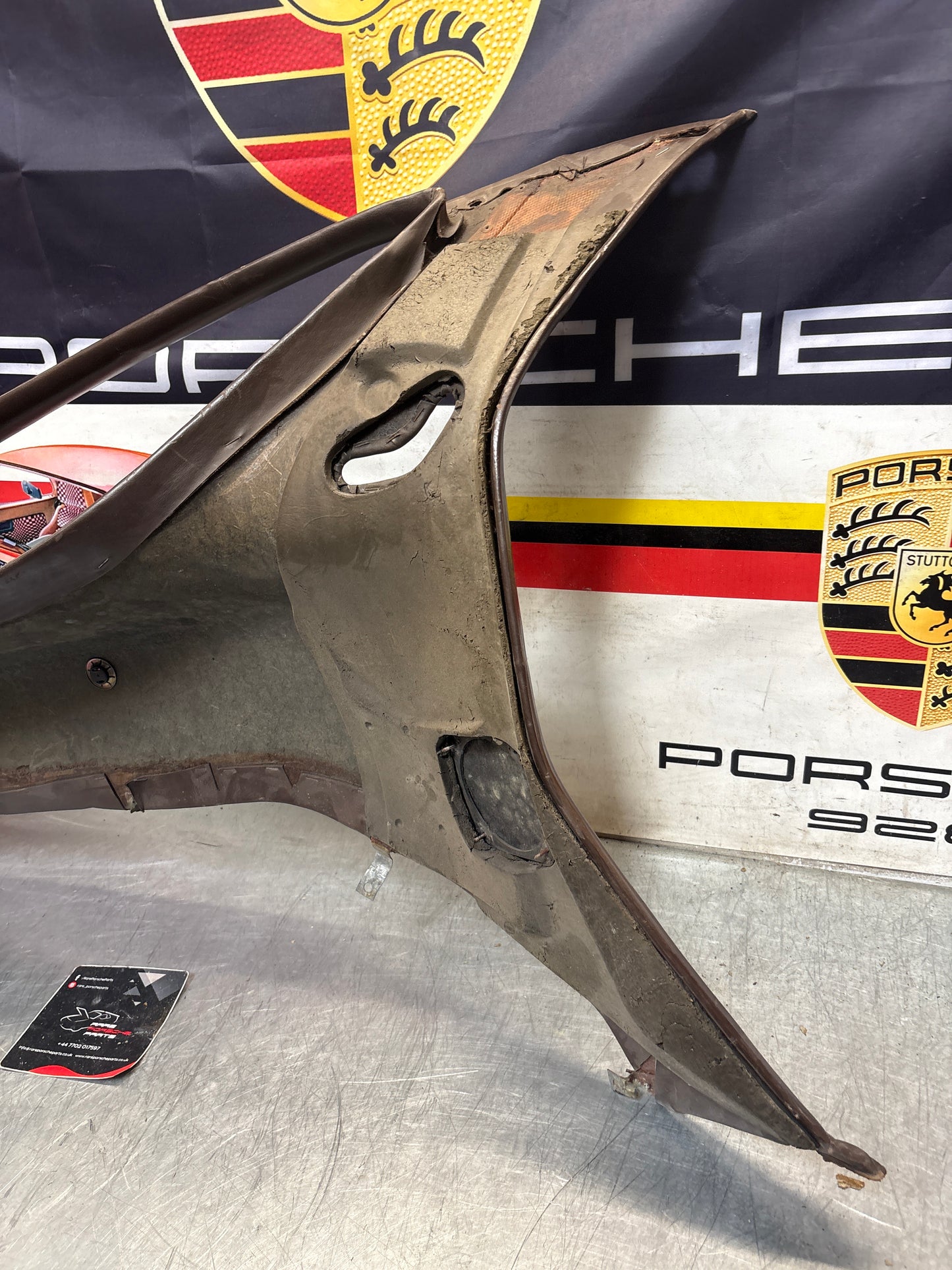 Porsche 928 early right side lower side trim panel, without loudspeaker, brown used 92855502202