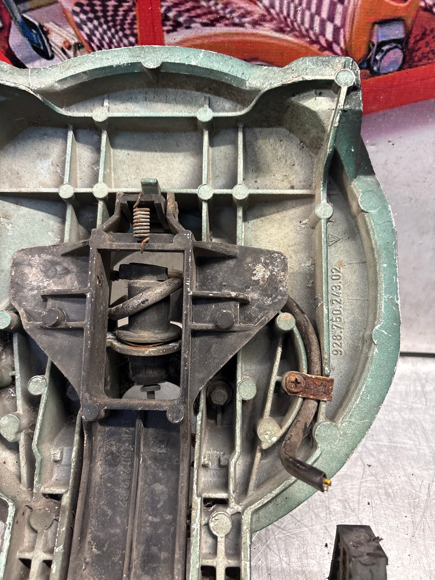 Porsche 928 right headlight swivel frame 92875024902 92875024302 used