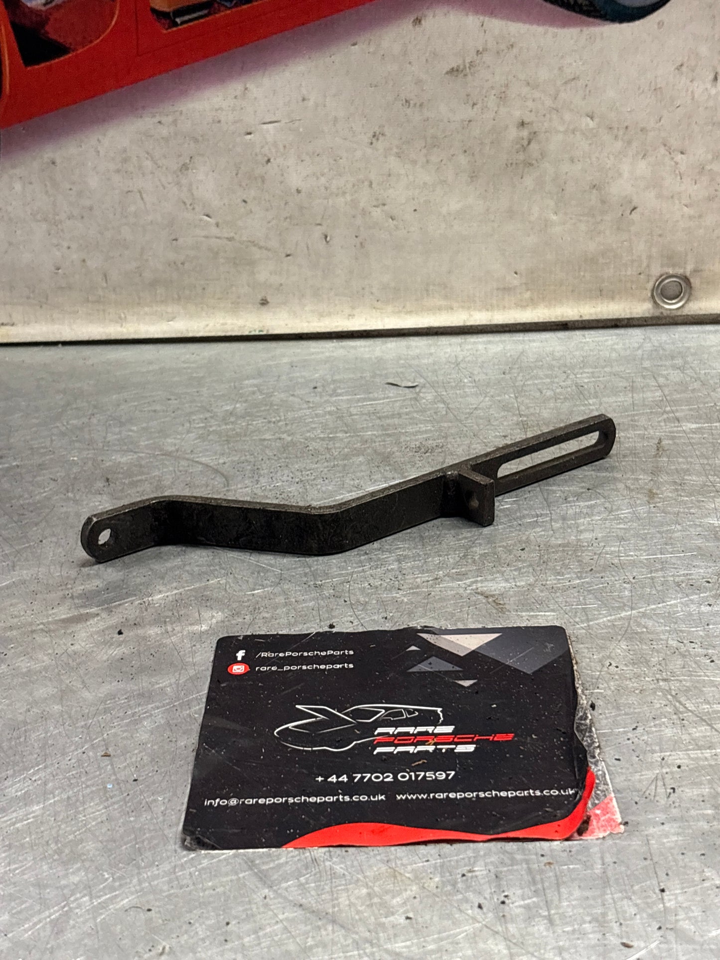 Porsche 928 air pump bracket 92811311310 / 99946000202, used