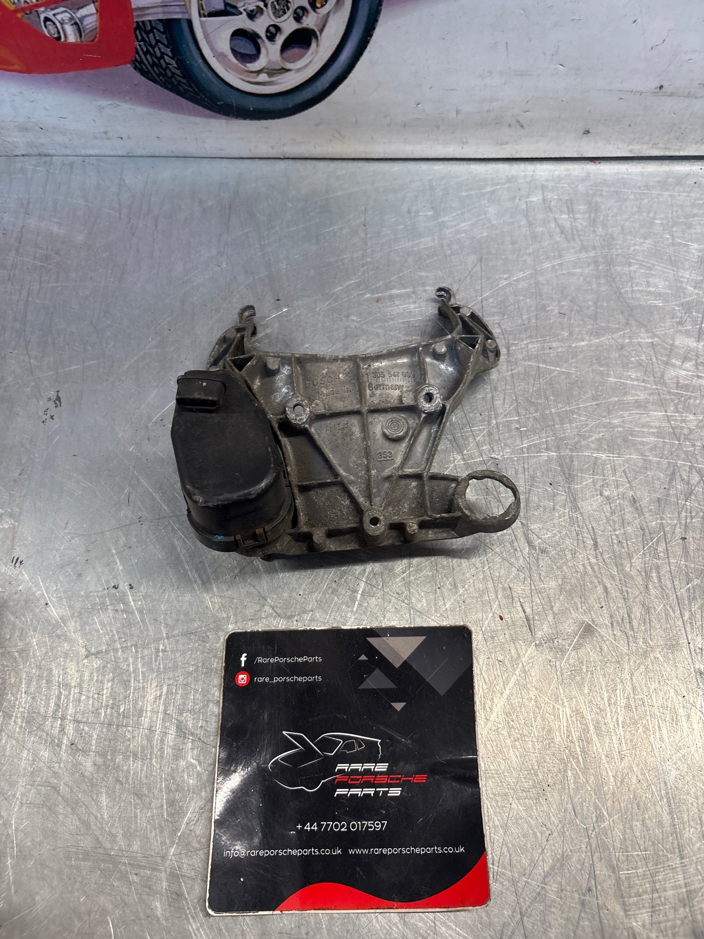 Porsche 968 headlight bracket housing,used  1305541099