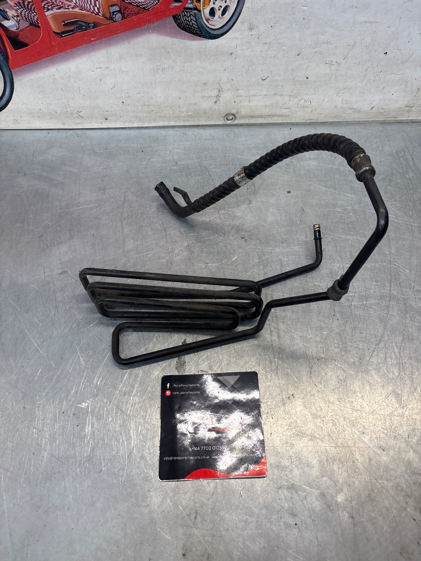 Porsche 944 PS Power steering return line pipe / cooler 944347459, used