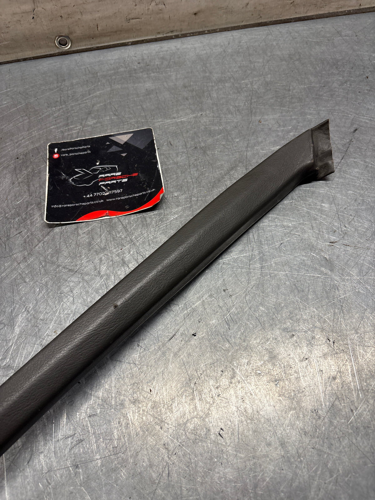 Porsche 928 left, off side door upper frame surround trim, grey 92855502502, used