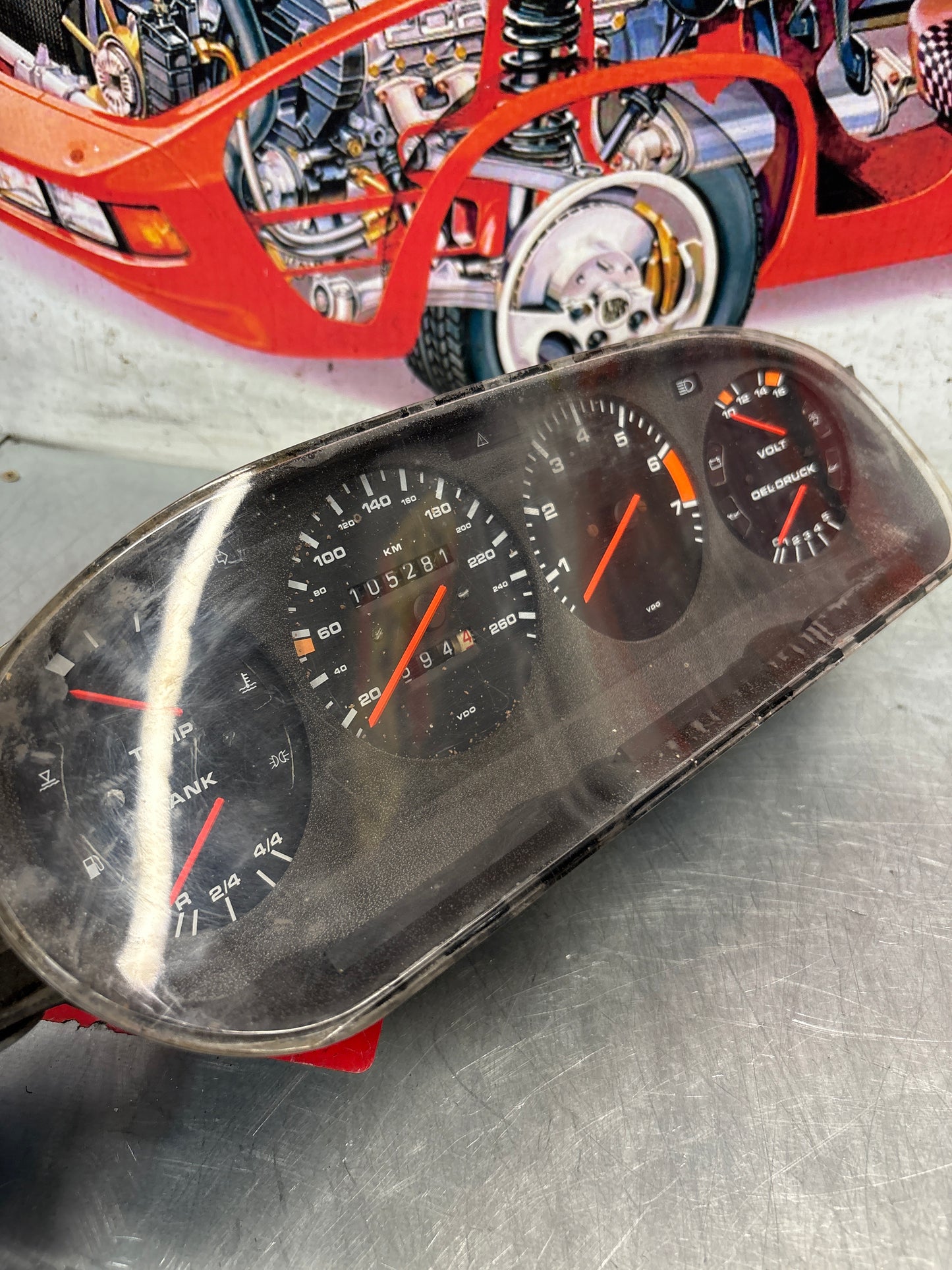 Porsche 928 dash clock binnacle pod speedometer, 92864110130 used  showing 105281 Km, plastic screen has some scratches