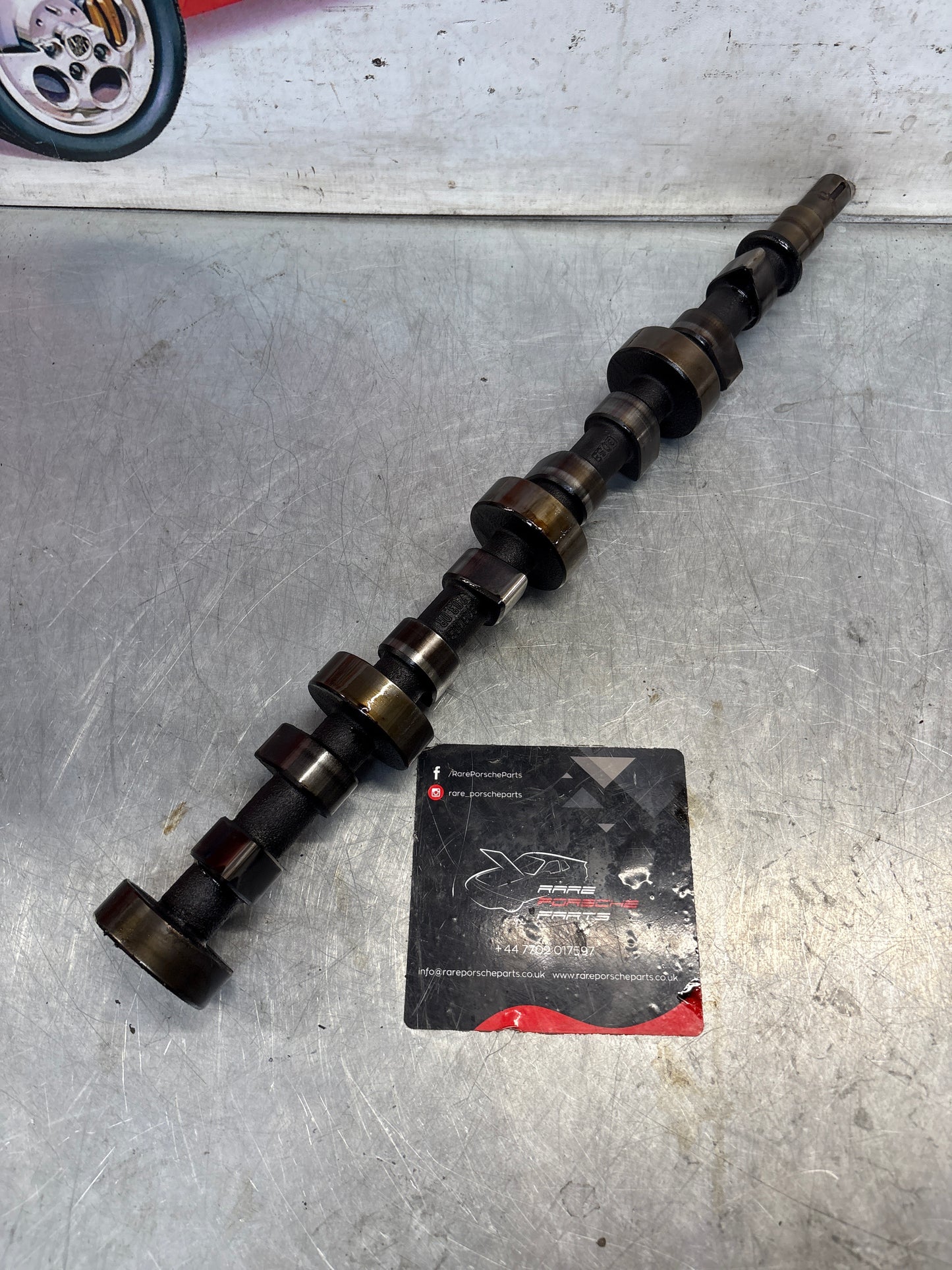 Porsche 928 cam shaft, used 9281052030R