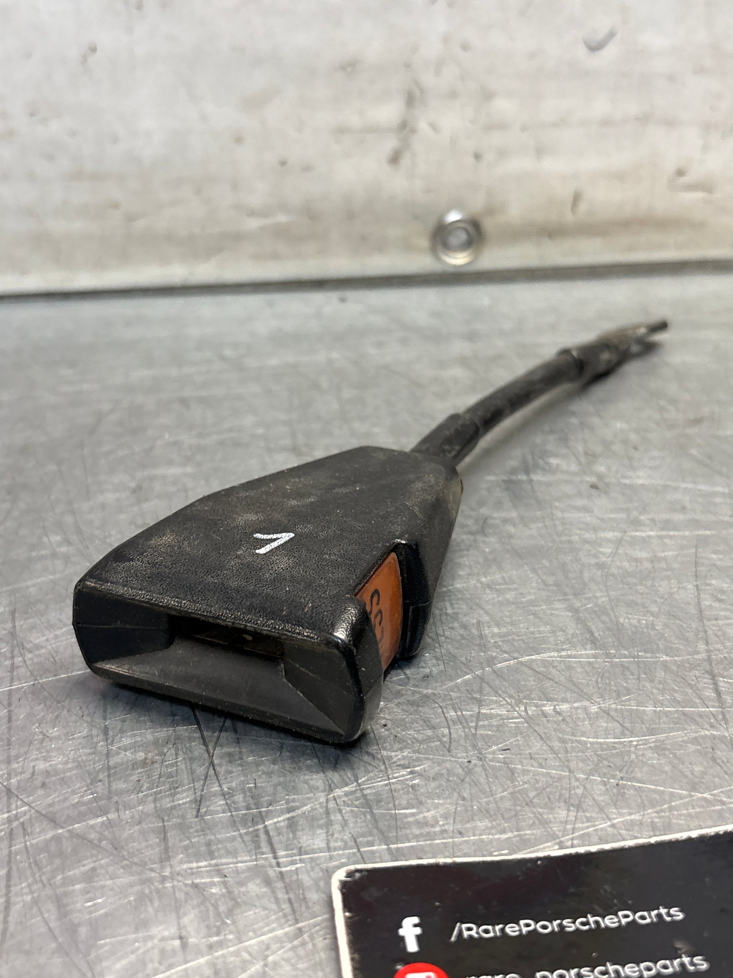 Used Porsche 924 early left seat belt anchor clasp retainer, buckle. 477857755D (used)