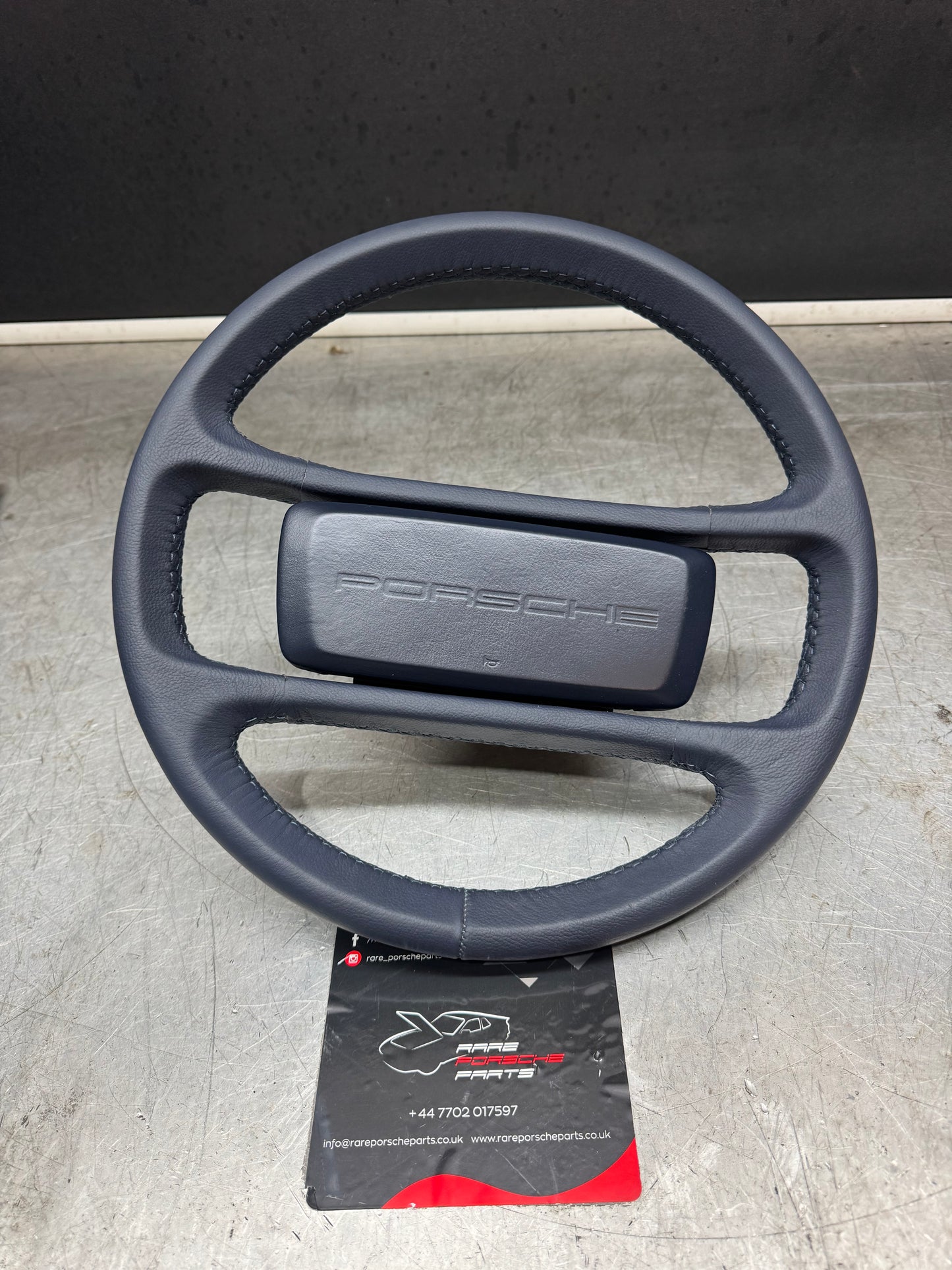 Porsche 944 blue leather steering wheel, refurbished. 94434708402