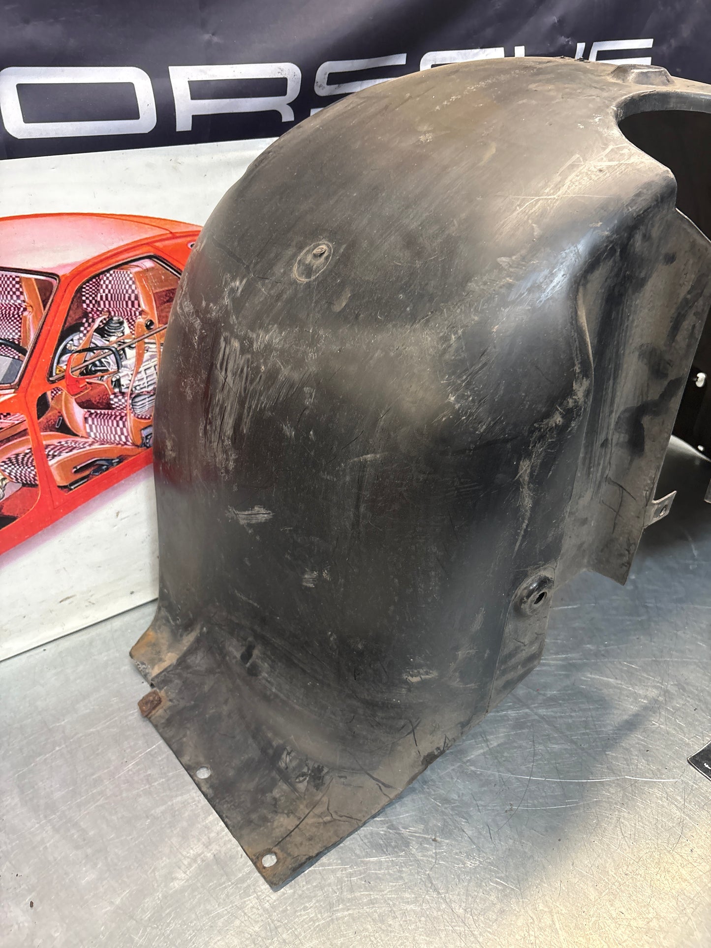 Porsche 944 from 85.5 wheel arch liner  Left, 94450438101 Used