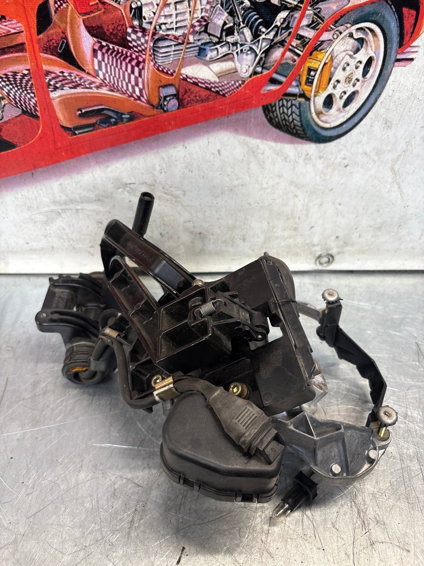 Porsche 968 right headlight swivel frame, for spares or repair 94475057200 / 94475057400 / 94475037800