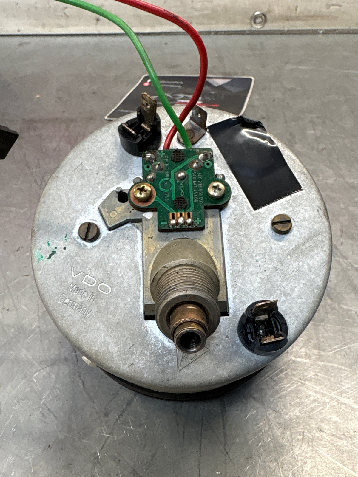 Porsche 924 S speedometer showing 76983 miles 94464103601 used
