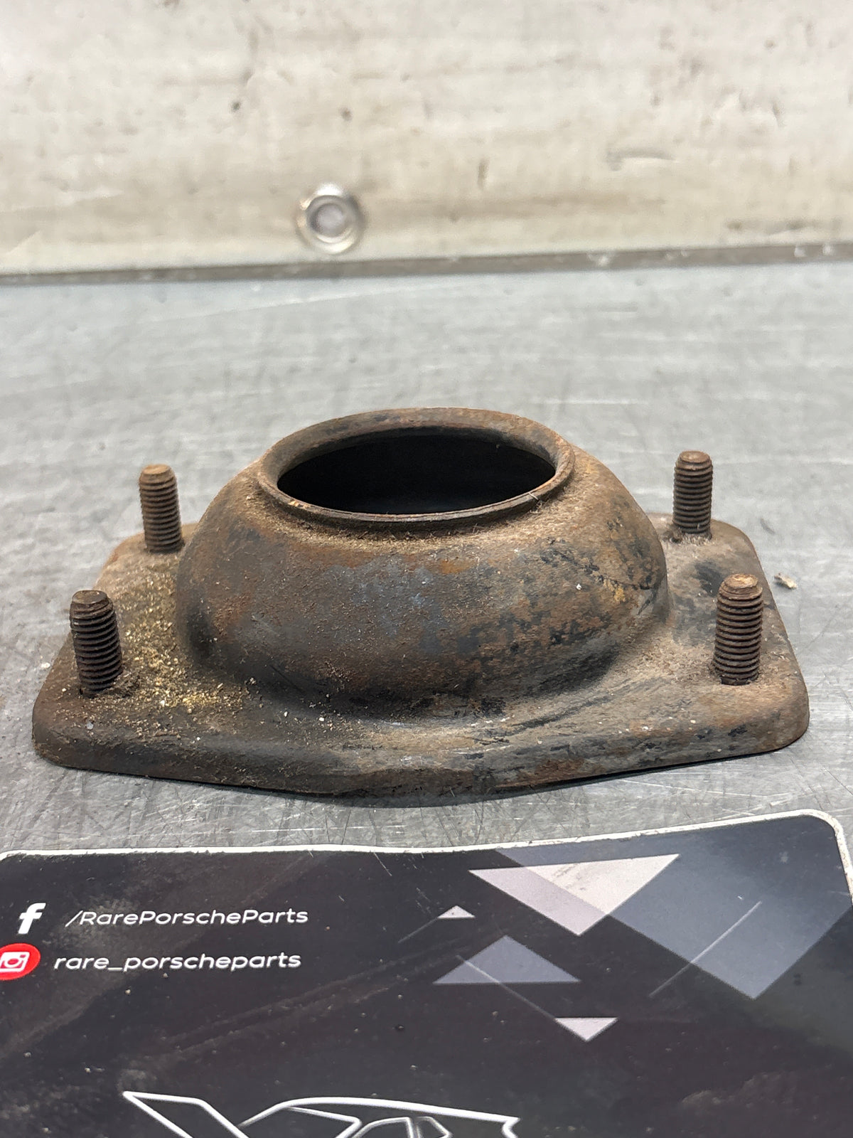 Porsche 924 / 944 front suspension bearing flange, 477412345, used