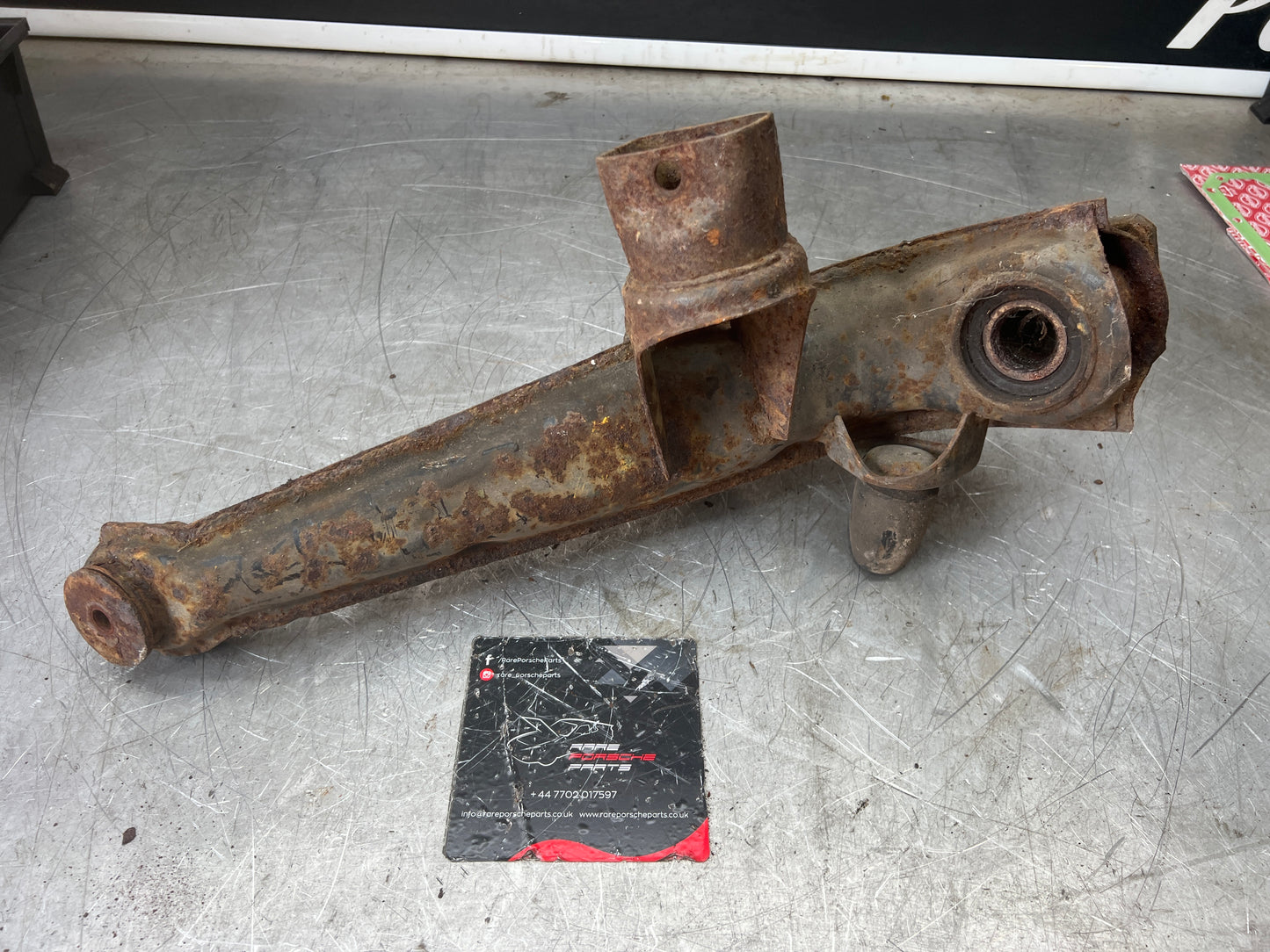 Porsche 924 944  -85.5 Rear left trailing arm, 94433102100