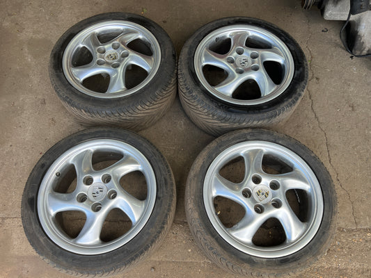 Aftermarket NPV Porsche twists style alloy wheels set, 5x130 staggered 7.5j and 9j wide late 944 fitment.