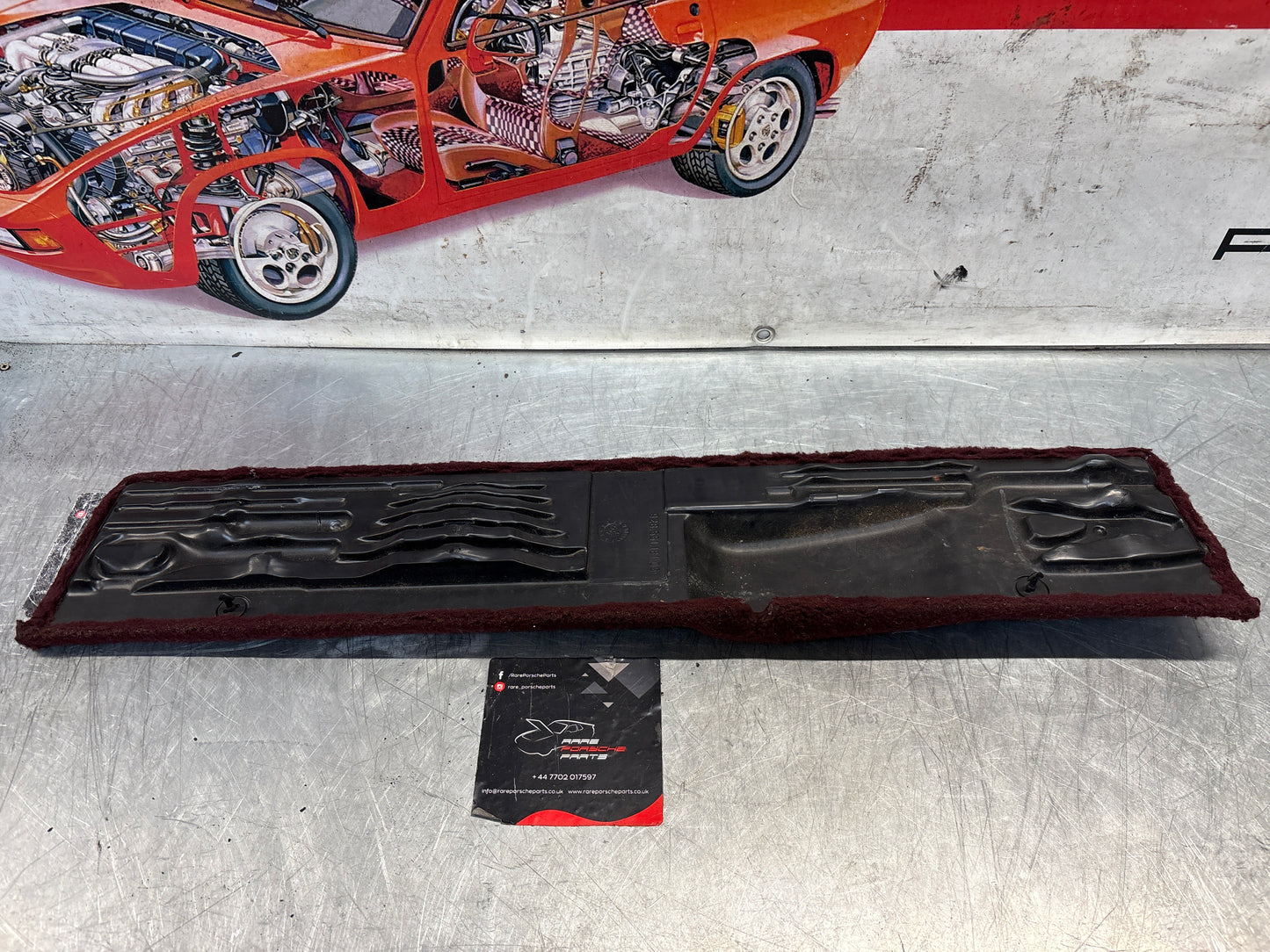 Porsche 928 burgundy carpeted Tool kit panel cover, used 92855118105