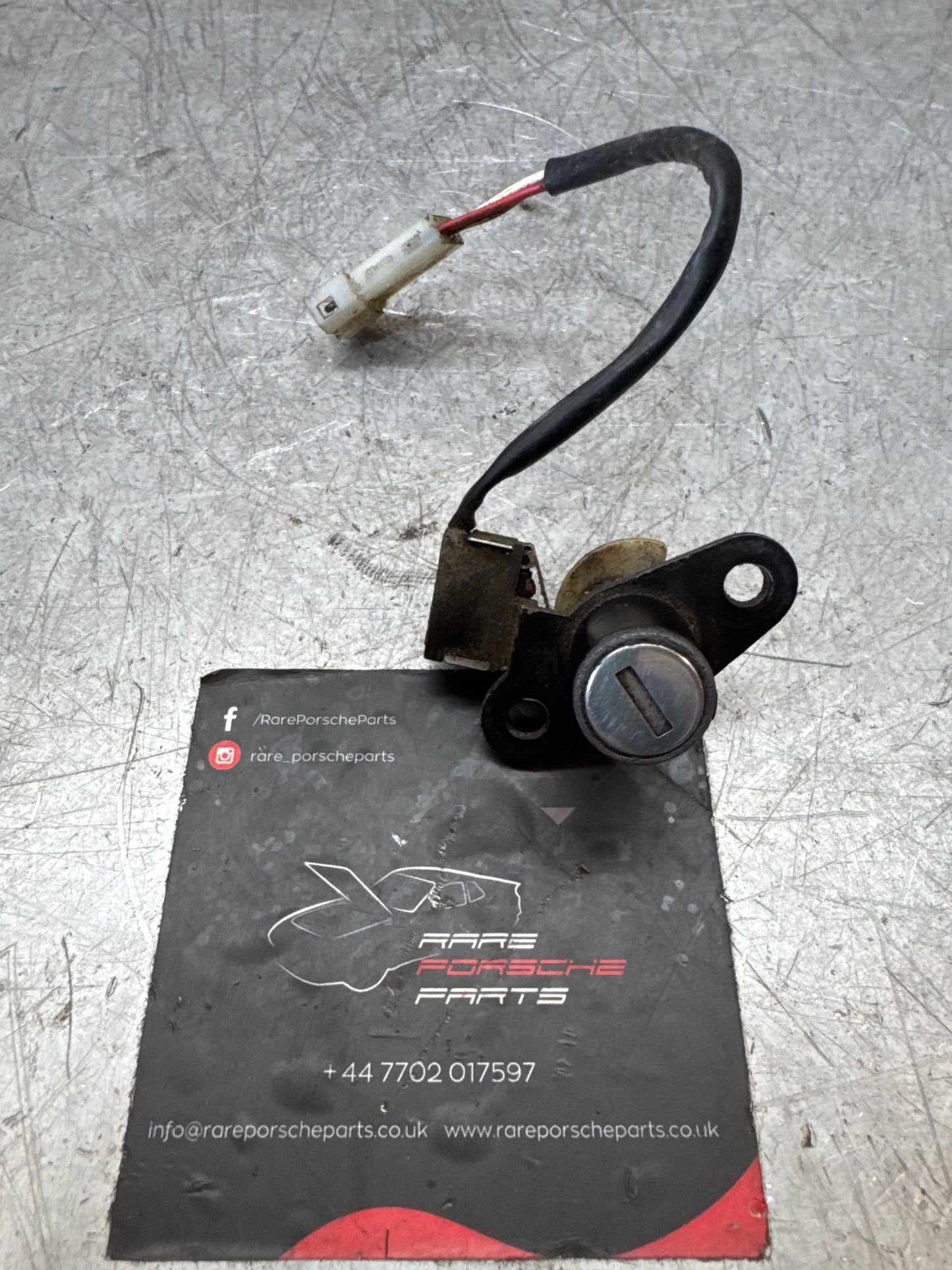 Porsche 944 late boot lock cylinder with microswitch, no key, used 94453891102