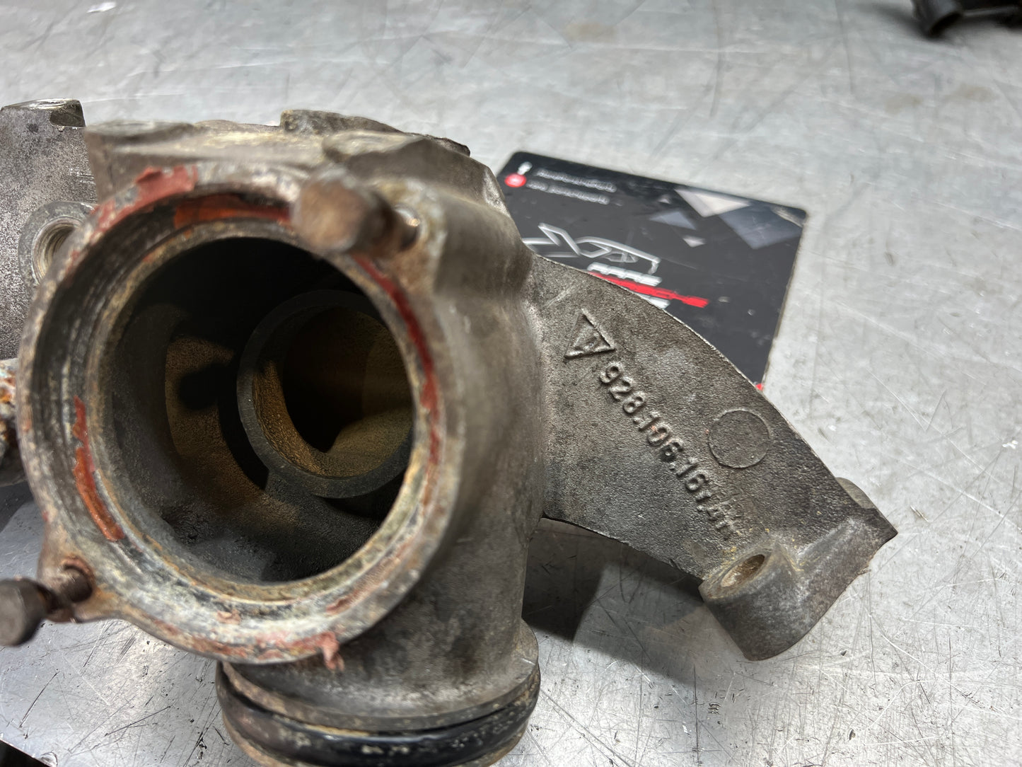 Porsche 928 thermostat housing, used 9281061614R