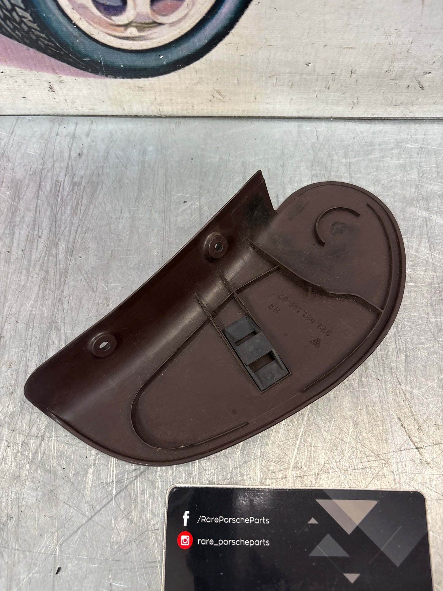 Porsche 928 seat hinge cover brown painted to black used 92852114802