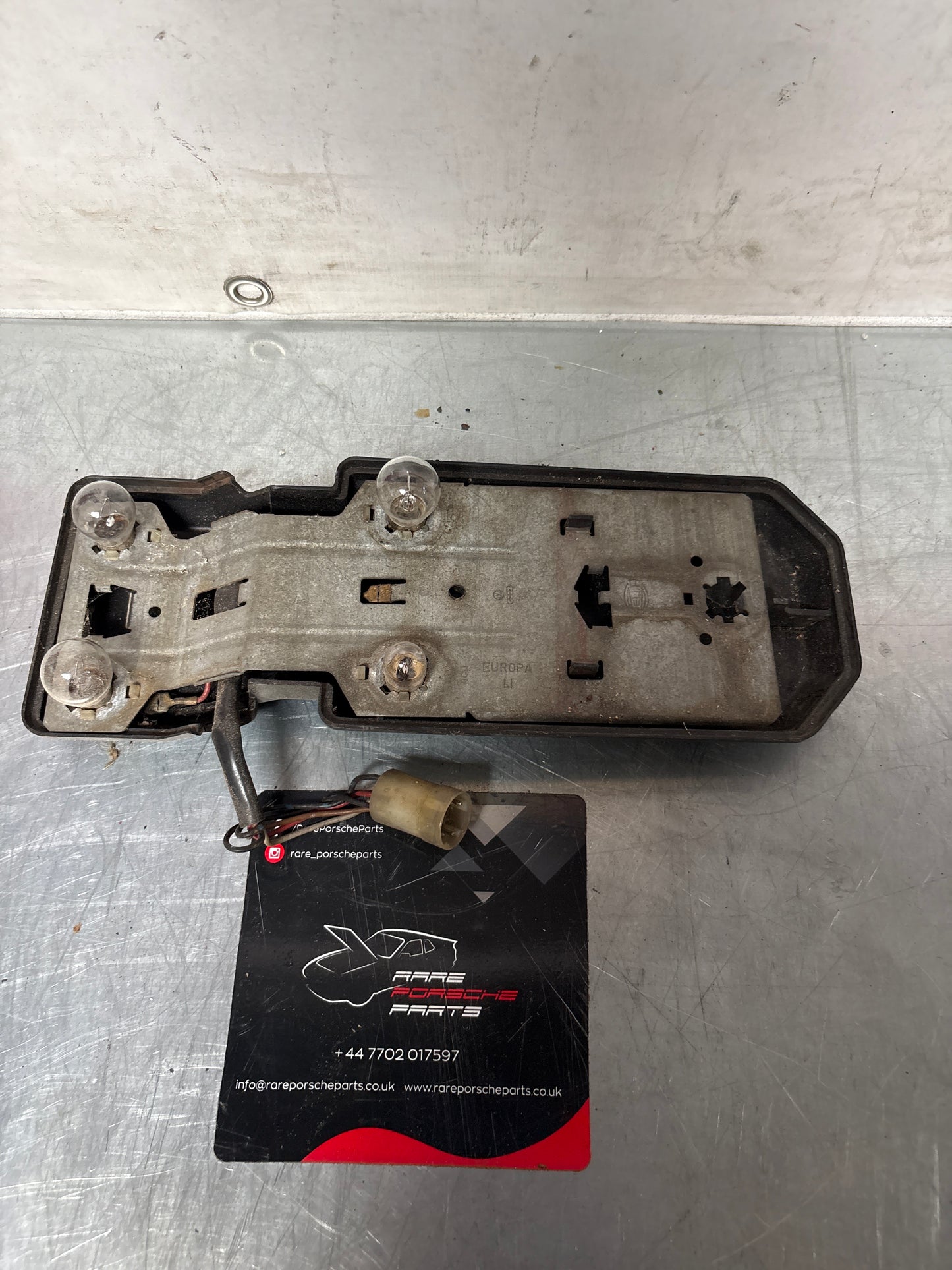 Porsche 944 Right Tail light lamp bulb holder and cover, used 477945114