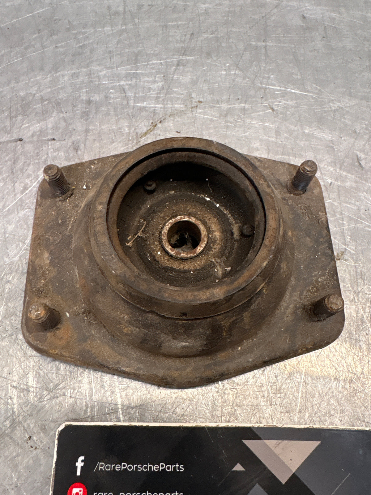 Porsche 924 / 944 front suspension bearing flange, 477412345, used