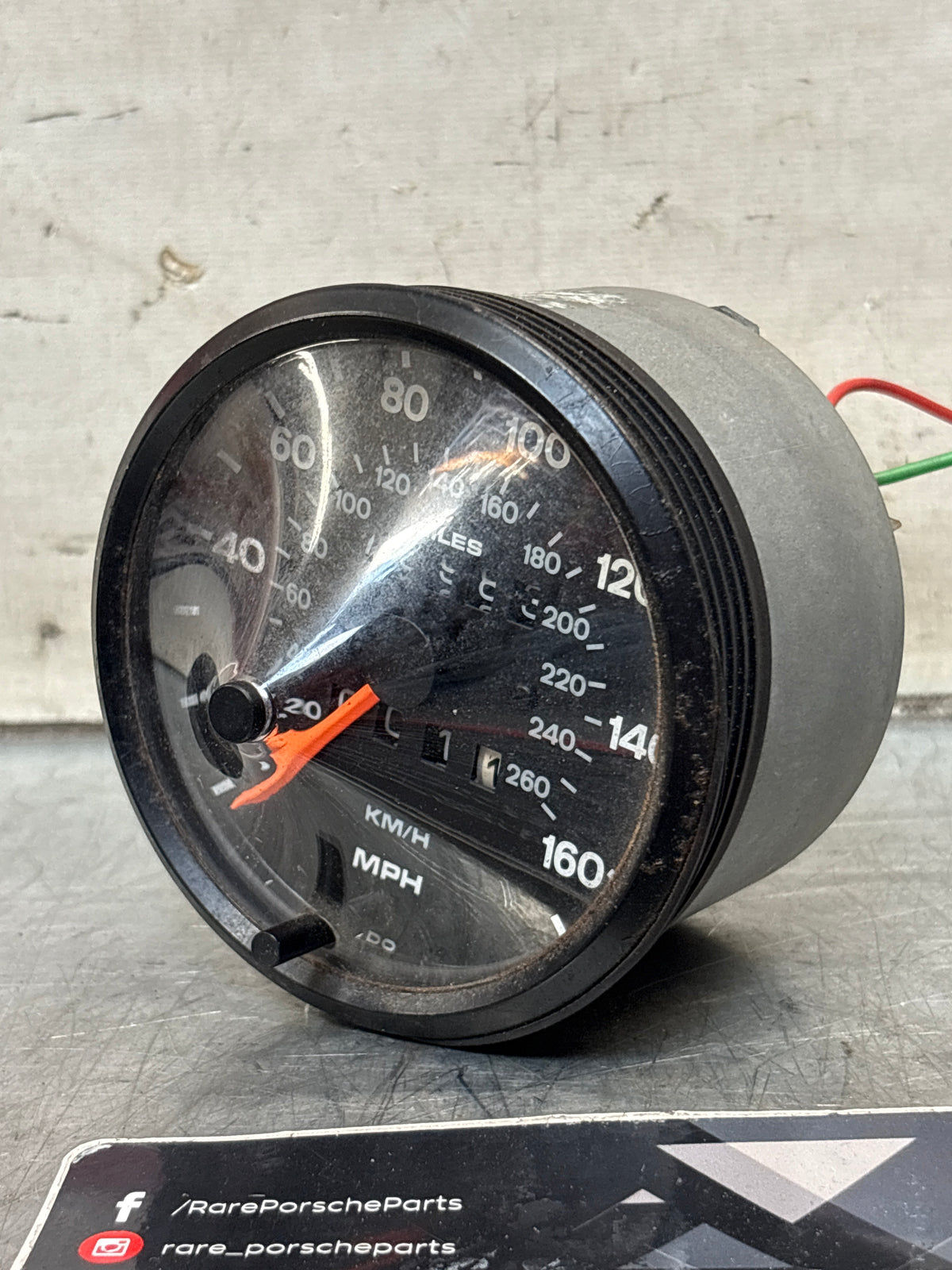 Porsche 924 S speedometer showing 76983 miles 94464103601 used