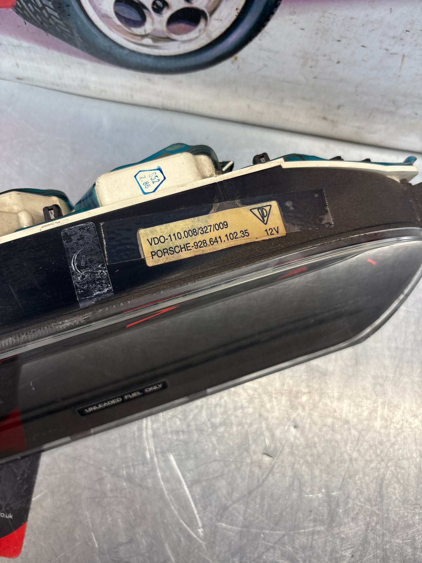 Porsche 928 dash clock binnacle pod speedometer, 92864110235 used  showing 046779 Km, plastic screen has some scratches