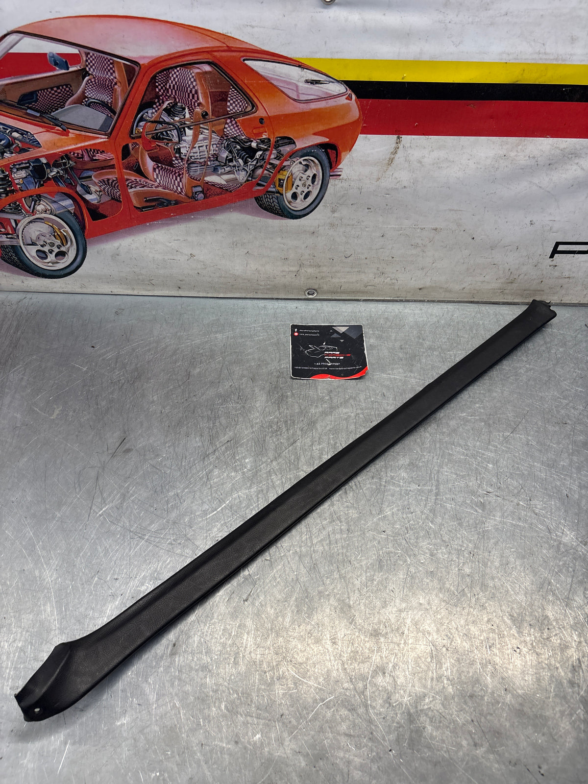 Porsche 928 tailgate trim, left, near side, black, 92855503702, used