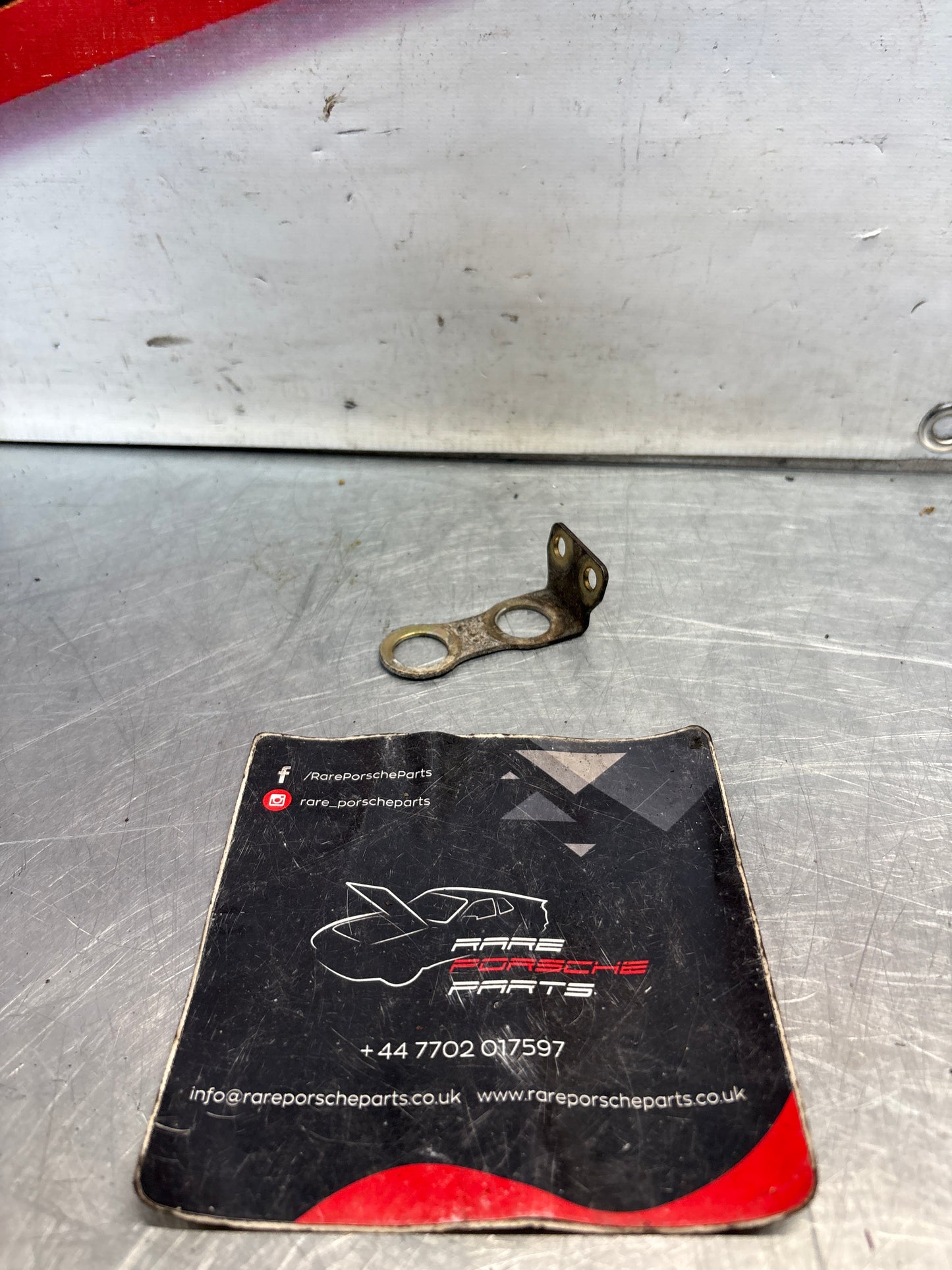 Porsche 944 S2/ 968 oil cooler bracket, used 94420731502
