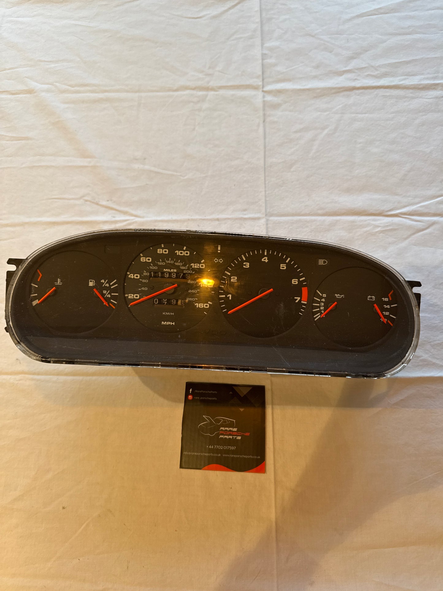 Porsche 944 dash clock binnacle pod speedometer, 94564131106 used 119979 miles plastic screen has some small scratches