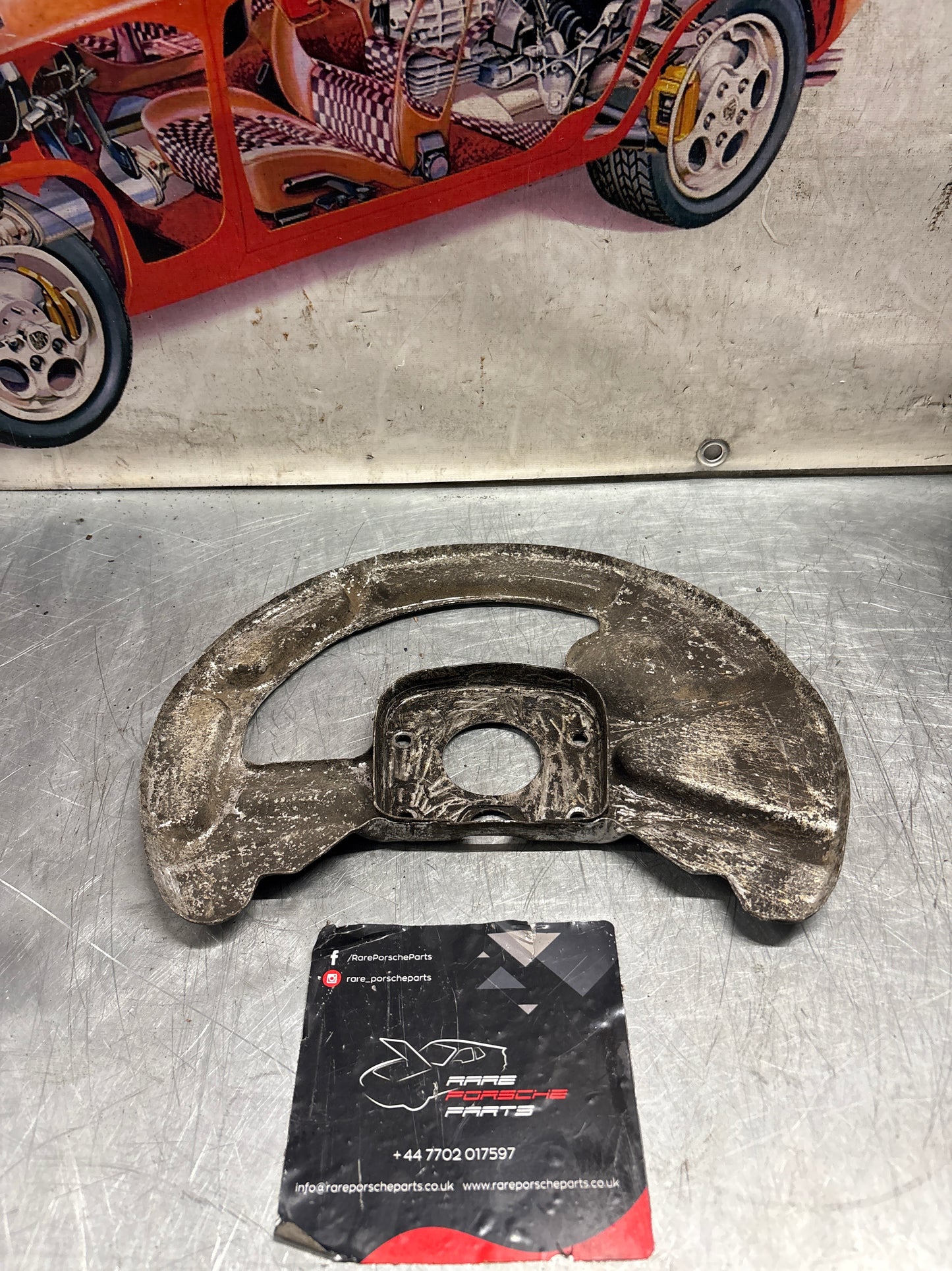 Porsche 928 front right brake disc cover,used 92835108400