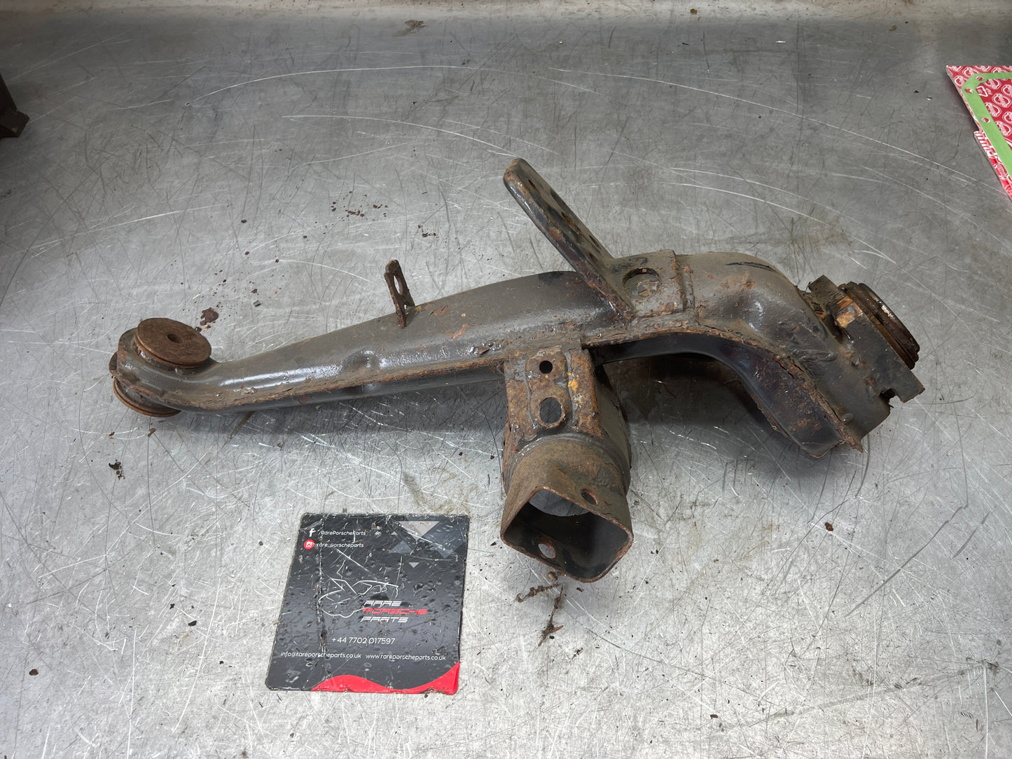Porsche 924 944  -85.5 Rear left trailing arm, 94433102100