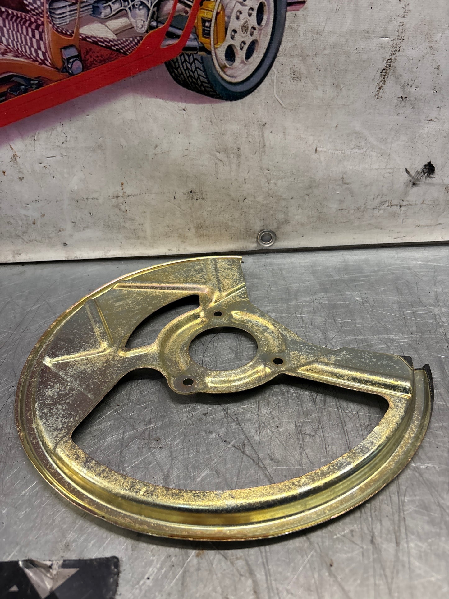 Porsche 968 front left brake dust cover plate, used 95135180502