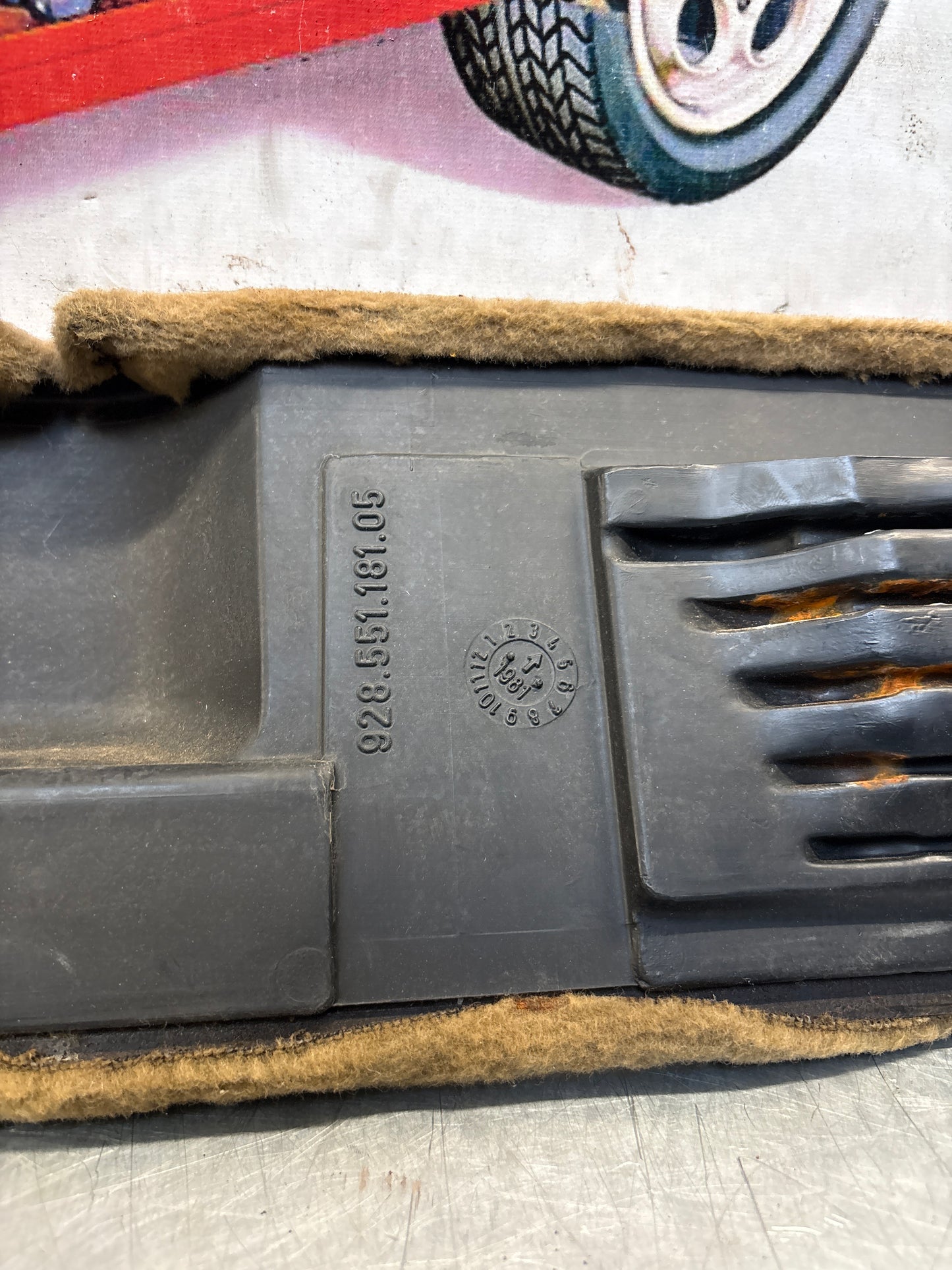 Porsche 928 greyish-beige carpeted Tool kit panel cover, used 92855118105