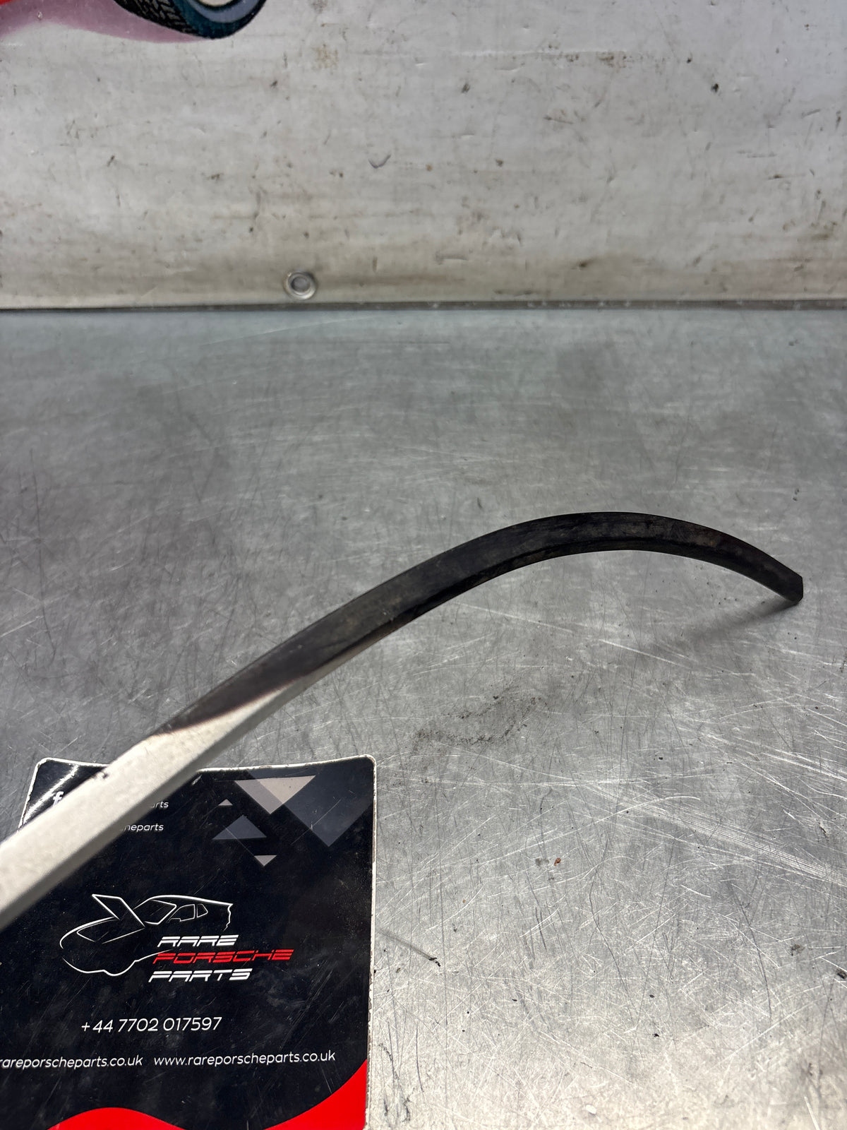 Porsche 928 rear left quarter glass cover strip, used 92854341708