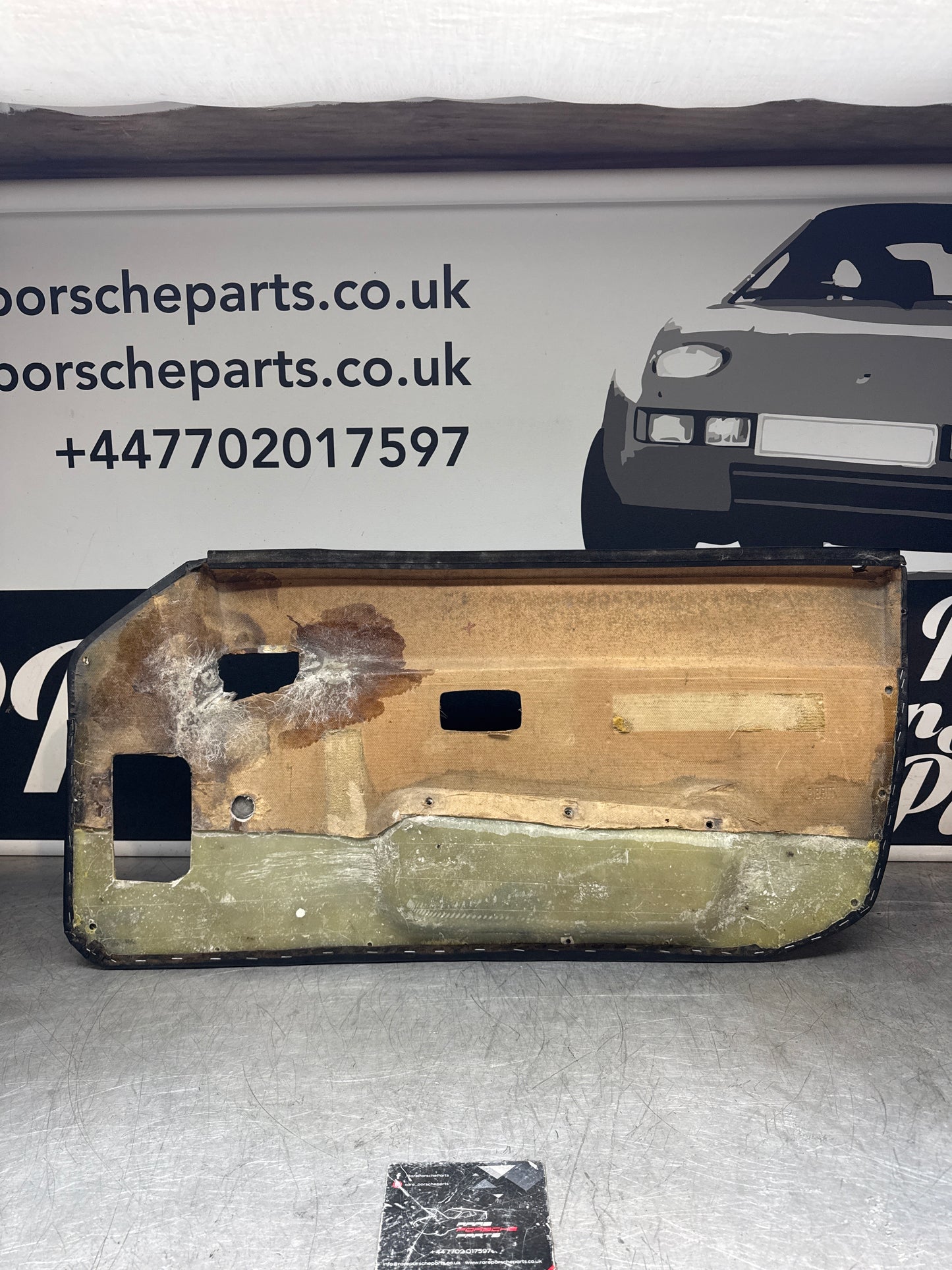 Porsche 944 left black door card for late cars from 85.5. Fibreglass repair.