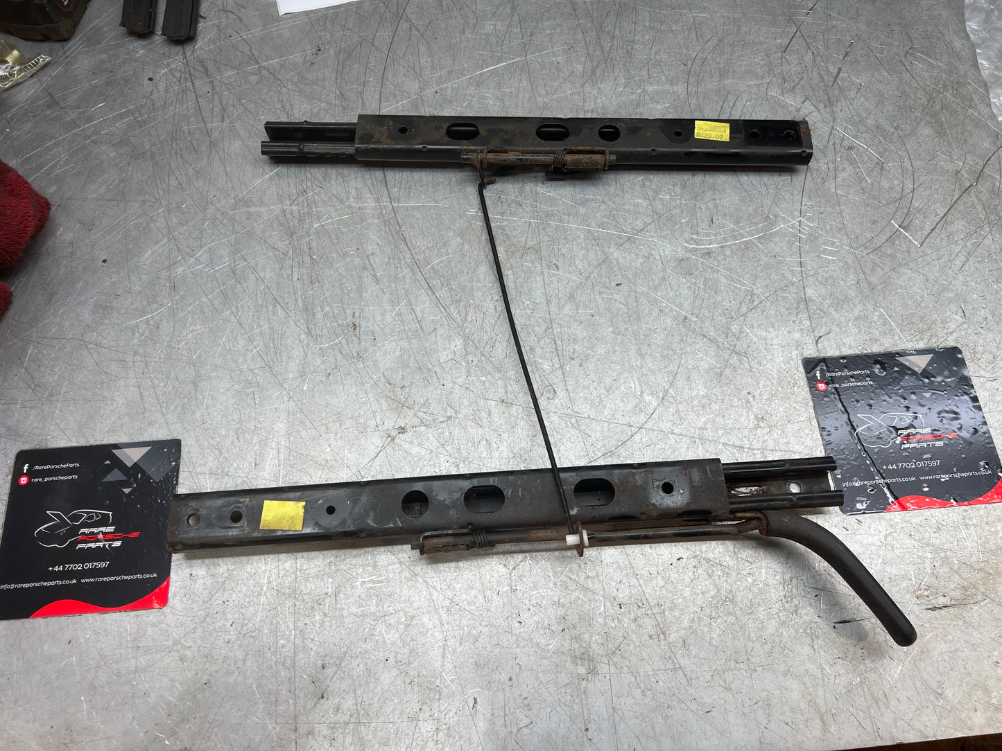 Porsche 944/968 pair of late type seat runners, manual, left side, used