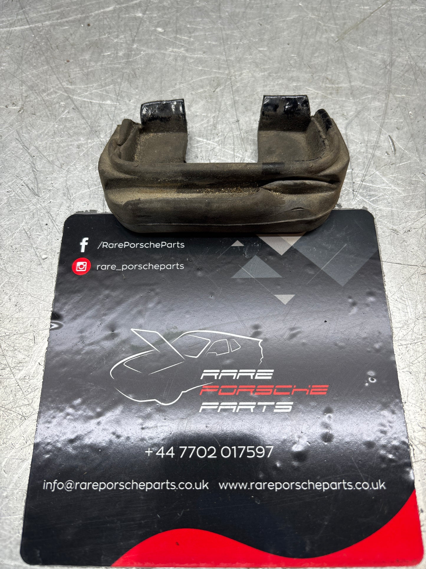 Porsche 944, S2/ 924S left tailgate latch pin gasket rubber, used 94451236501