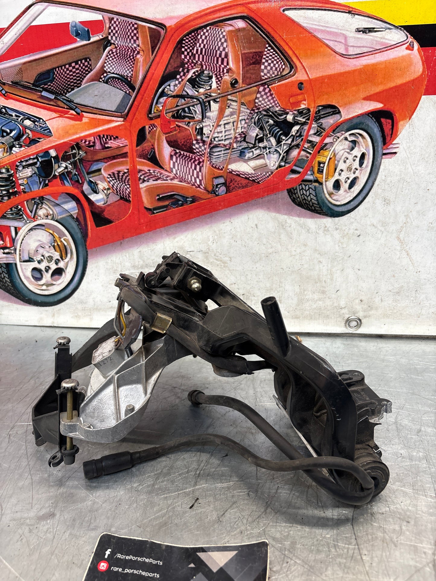 Porsche 968 right headlight swivel frame, for spares or repair 94475057200 / 94475057400 / 94475037800