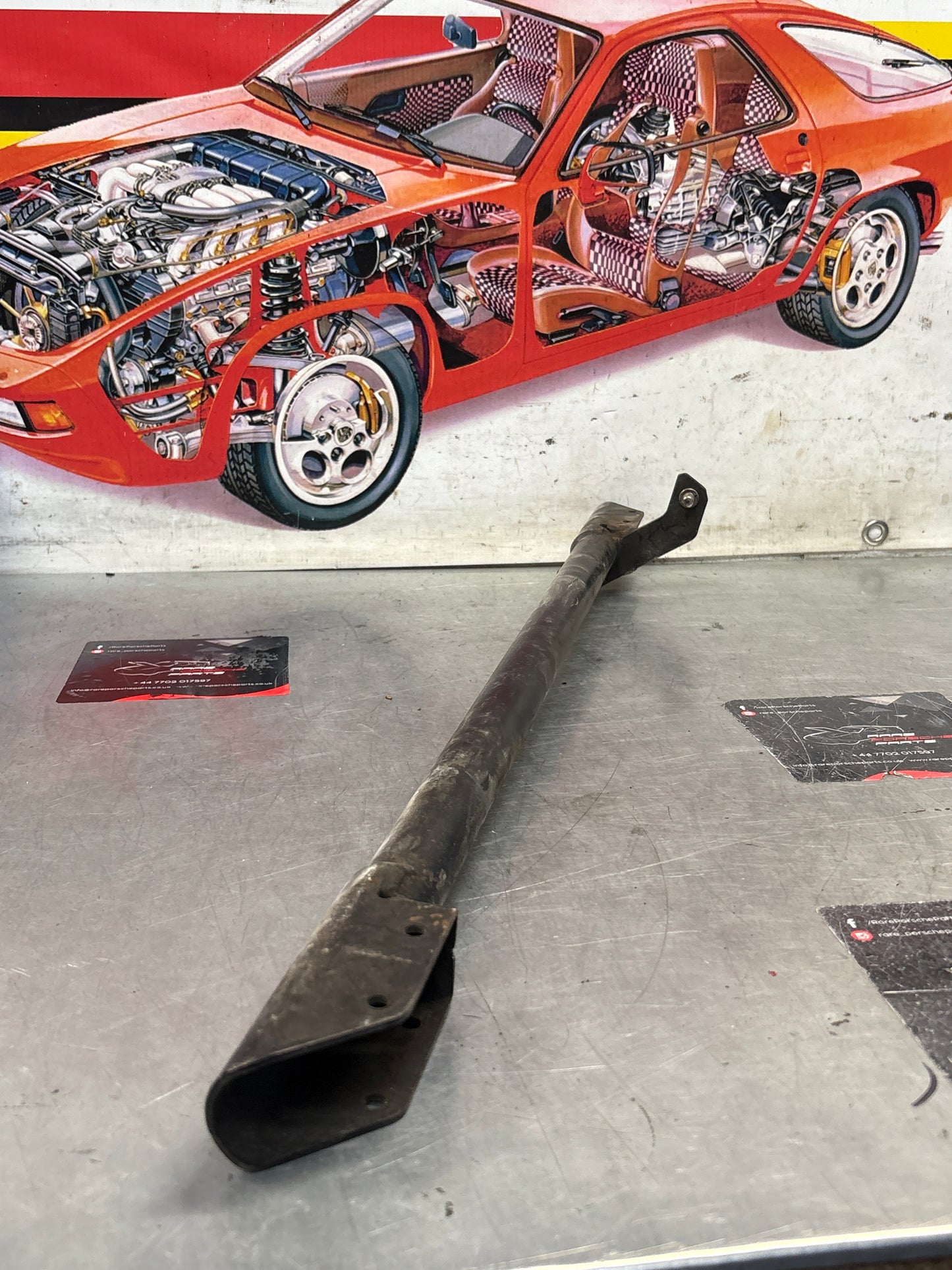 Porsche 928 Head light centre shaft, used, 92875004105