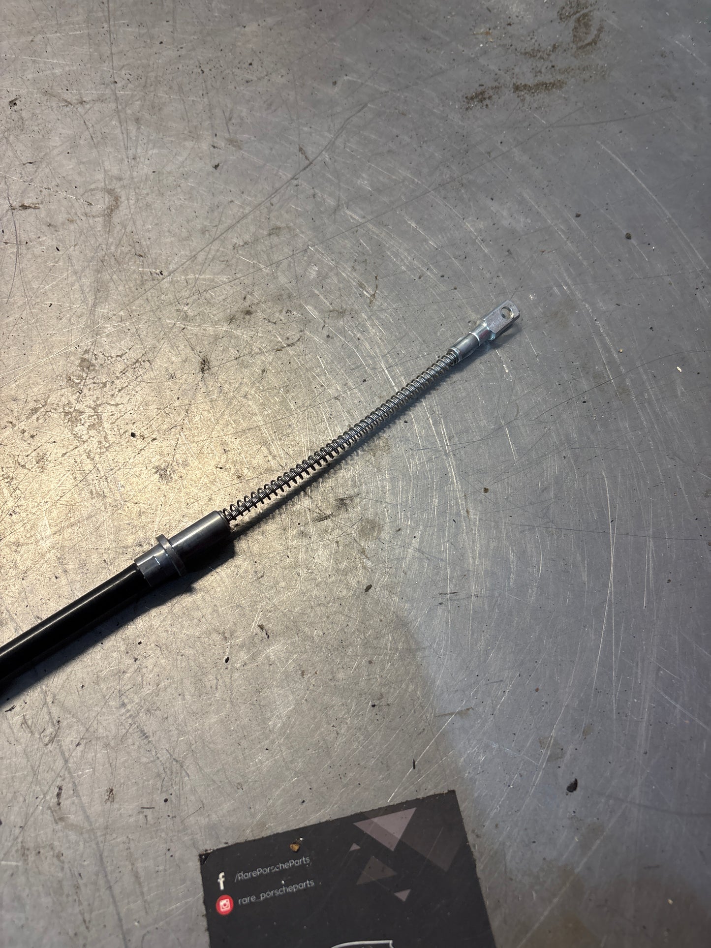 Porsche 944 short handbrake cable, new 95142407102