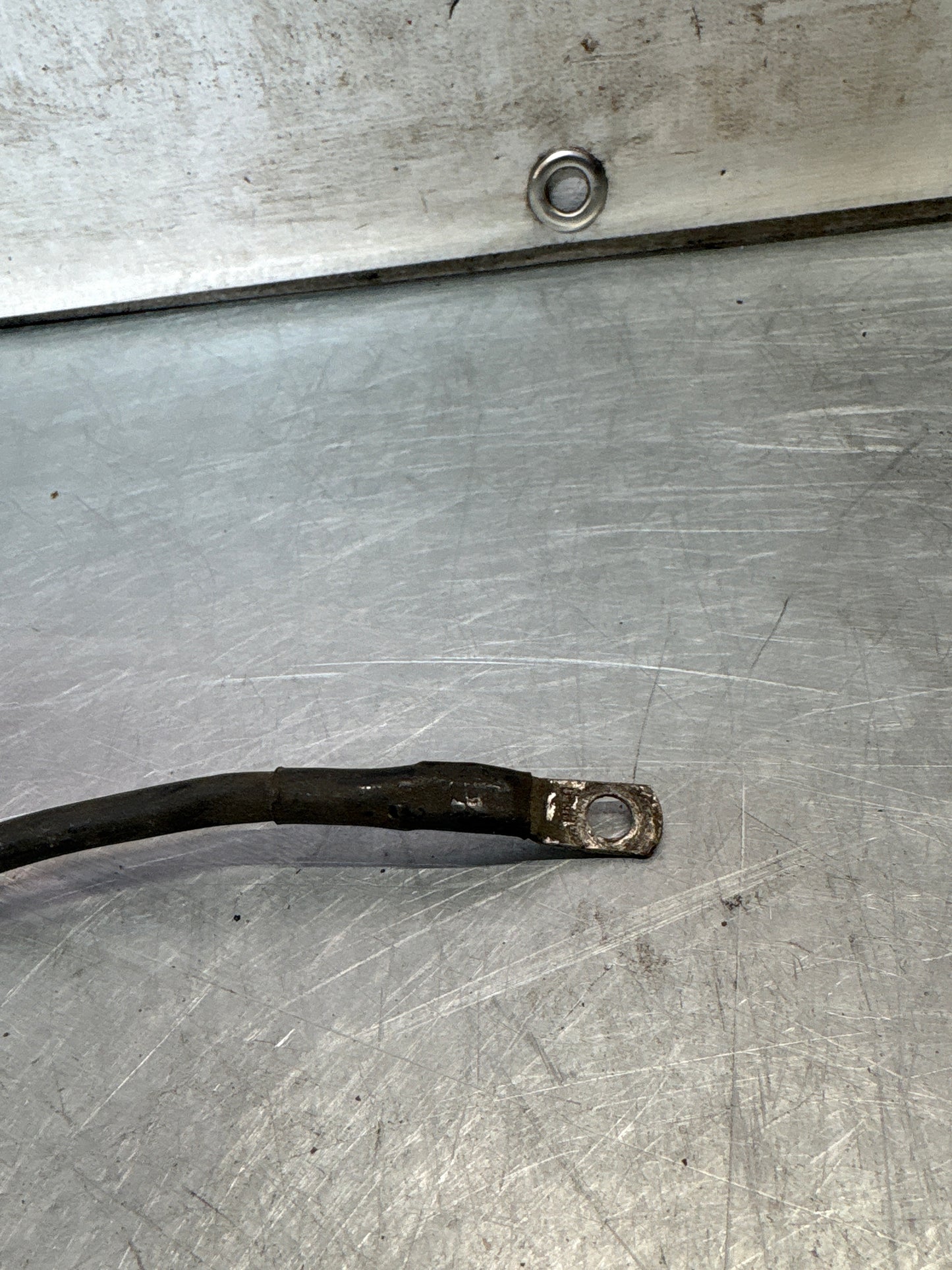 Porsche 944 ground strap engine to body, used 477971235
