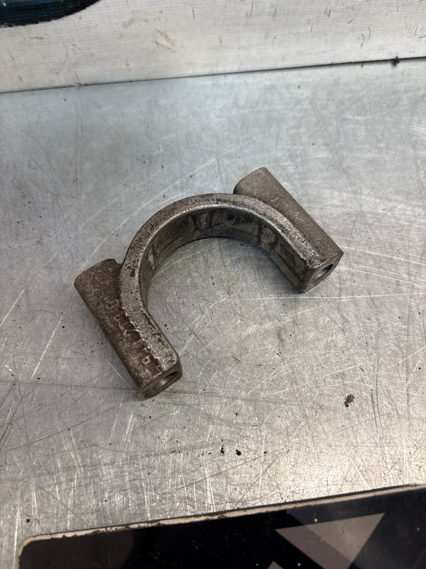 Porsche 944 steering rack clamp, used 94434722301