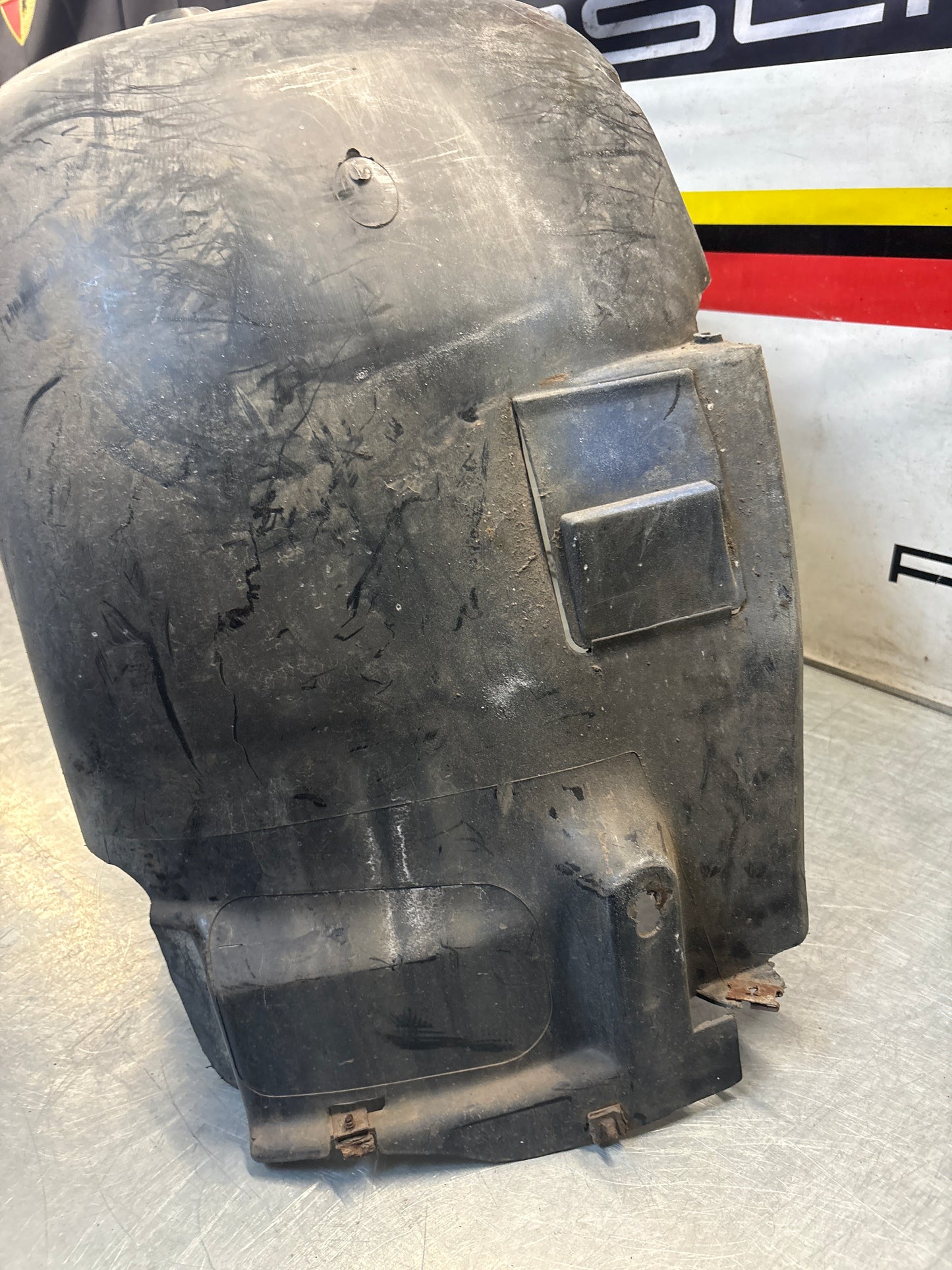 Porsche 944 from 85.5 wheel arch liner  Left, 94450438101 Used