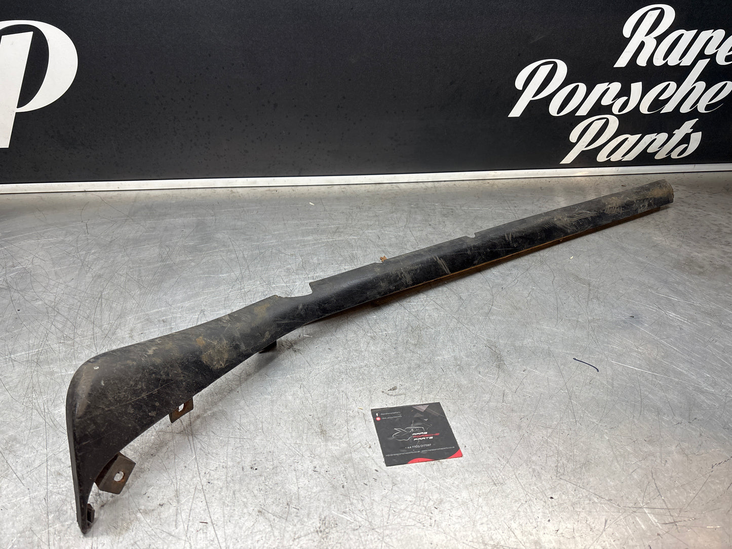 Porsche 944 lower door sill trim molding left side, used 95155919500