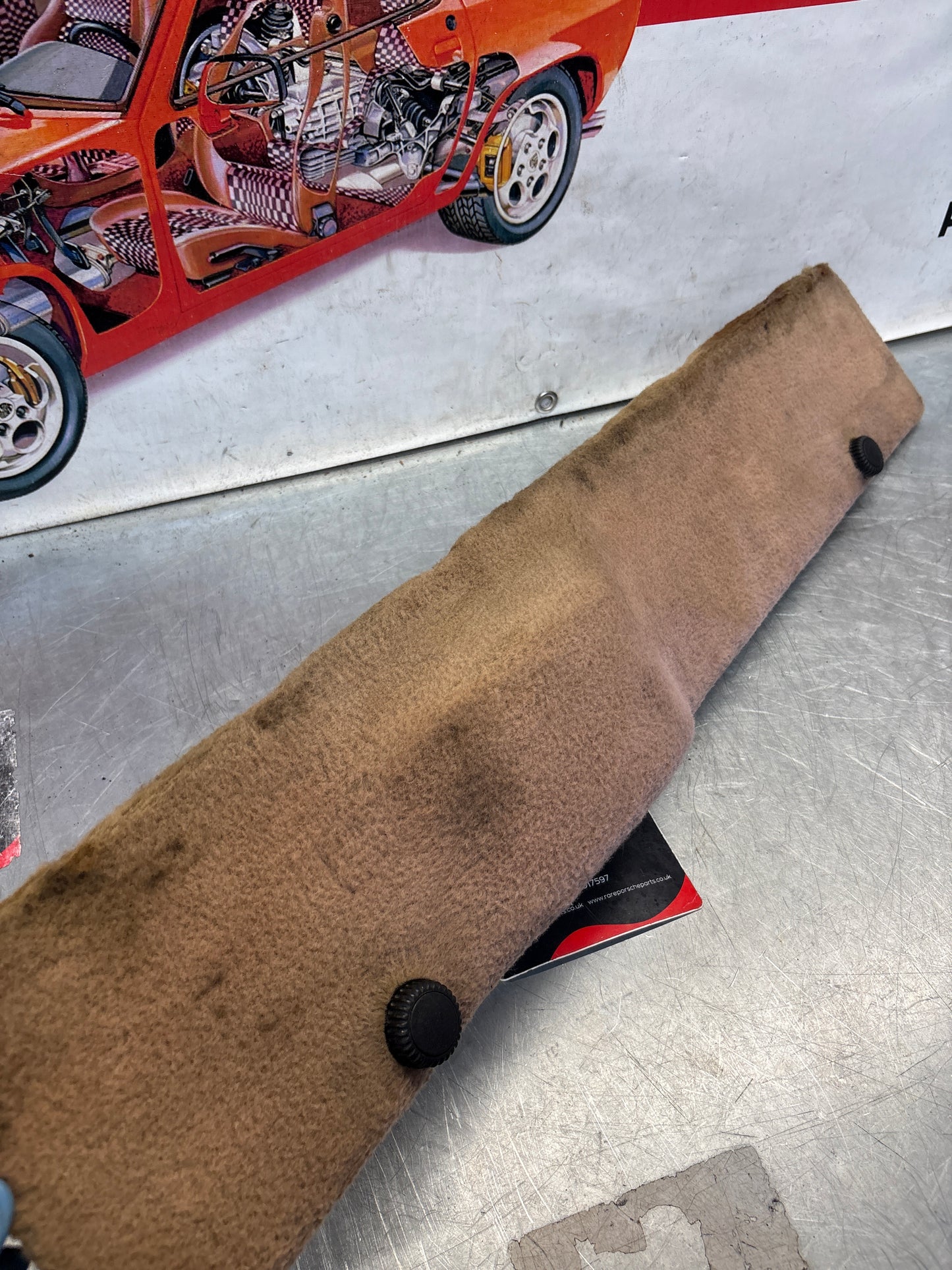 Porsche 928 greyish-beige carpeted Tool kit panel cover, used 92855118105