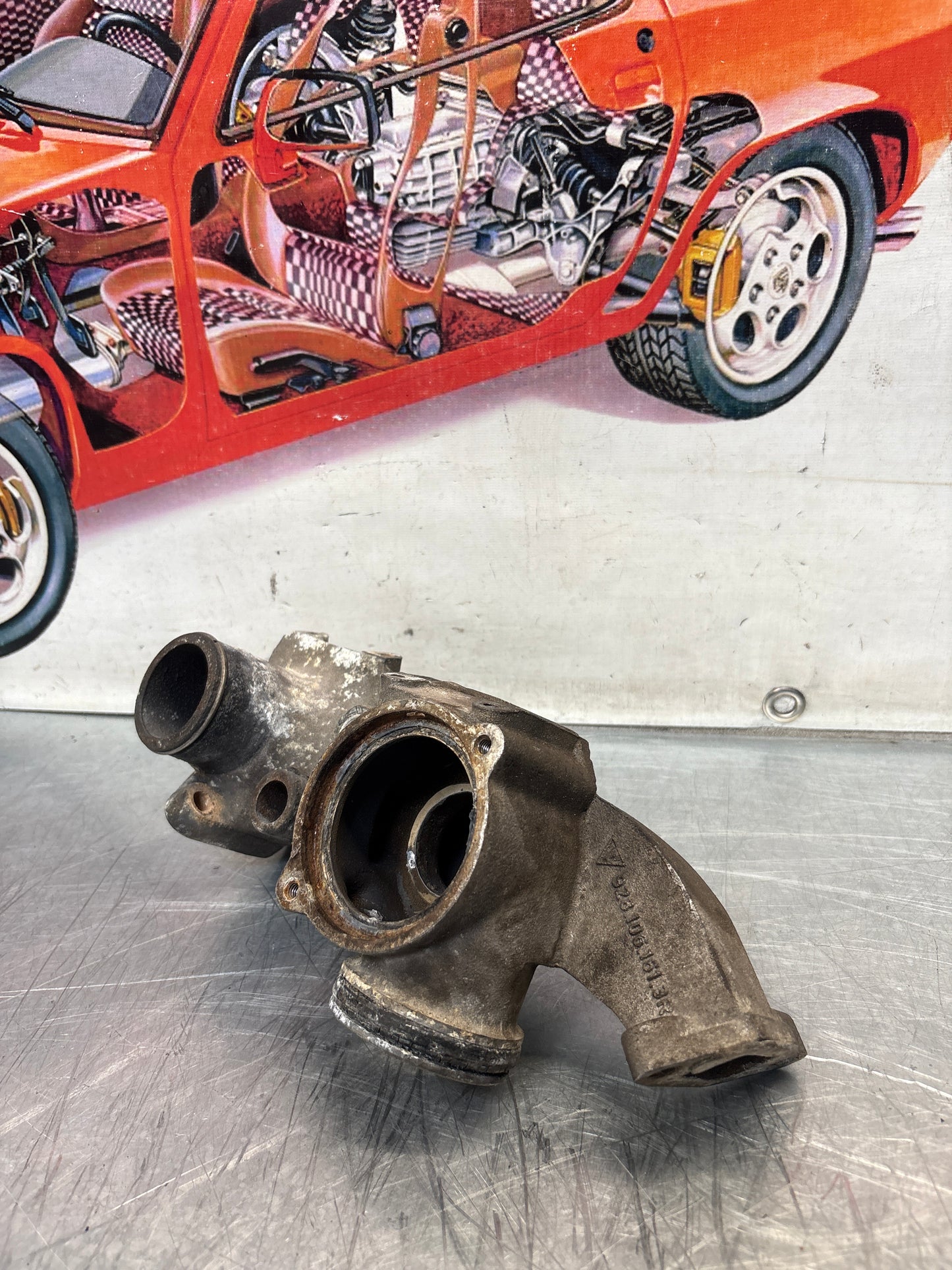 Porsche 928 thermostat housing, used 9281061613R